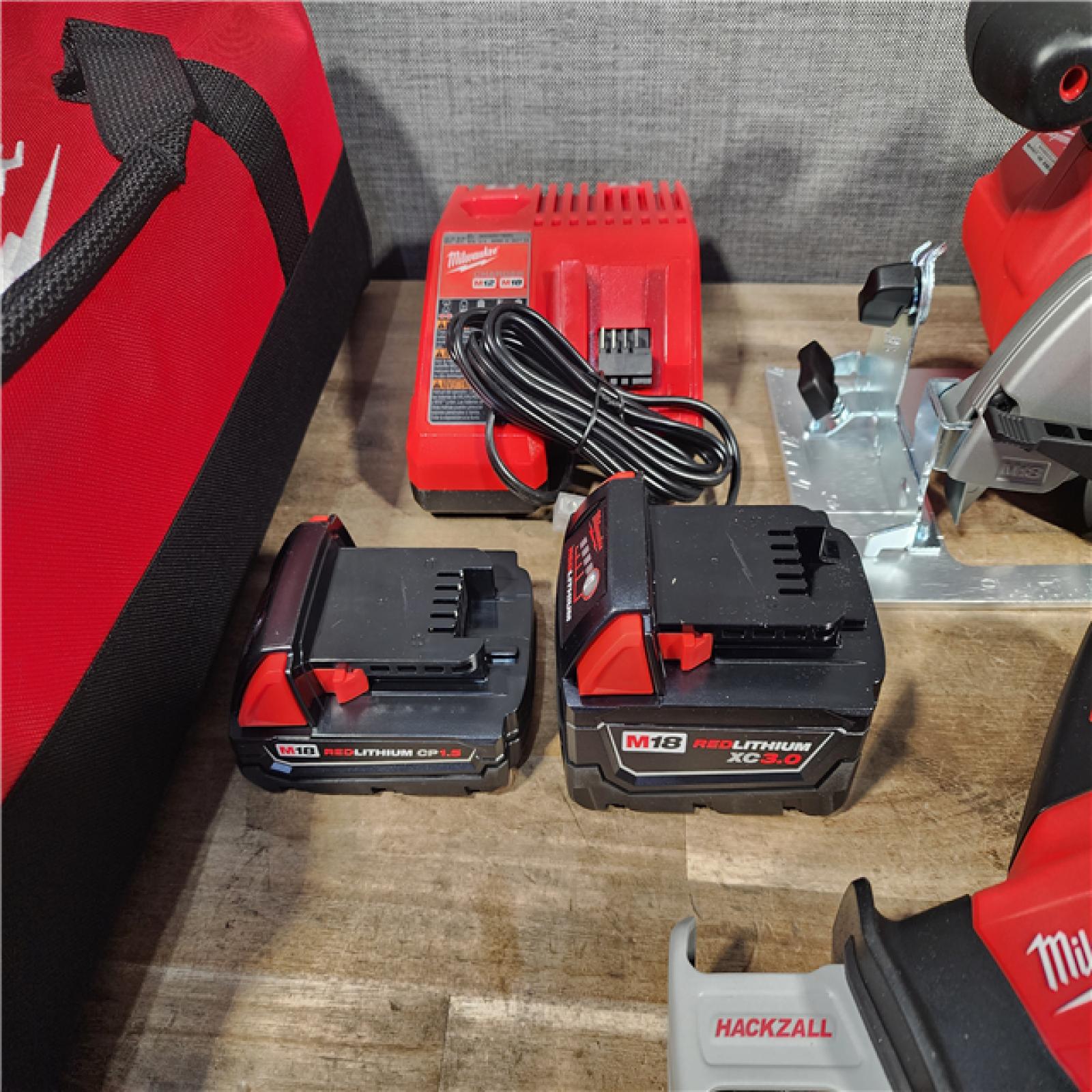 HOUSTON LOCATION - AS-IS MILWAUKEE 5 TOOL COMBO KIT W/ (2) BATTERY & CHARGER