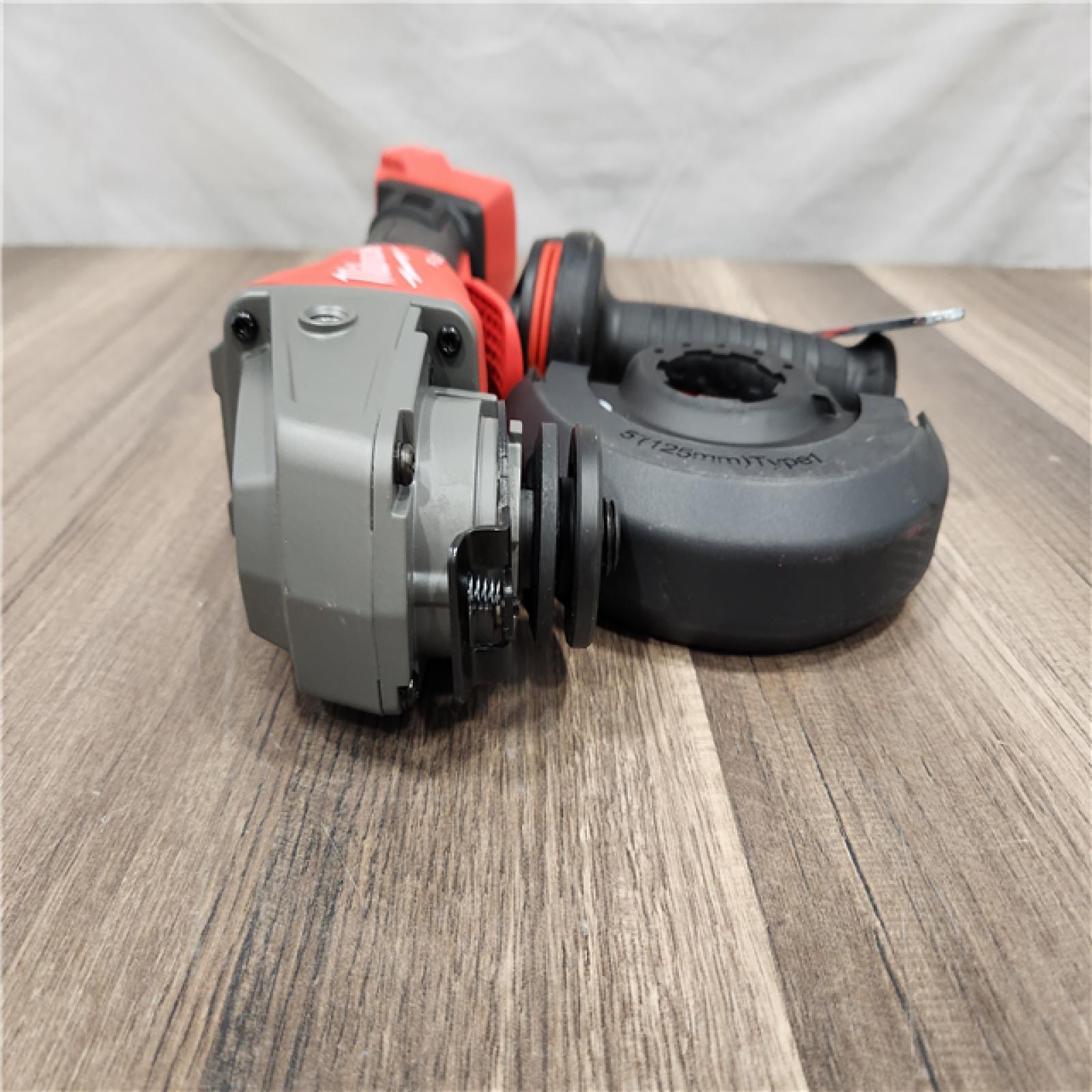 AS-IS Milwaukee M18 FUEL 18V Lithium-Ion Brushless Cordless 4-1/2 in./5 in. Grinder w/Paddle Switch (Tool-Only)