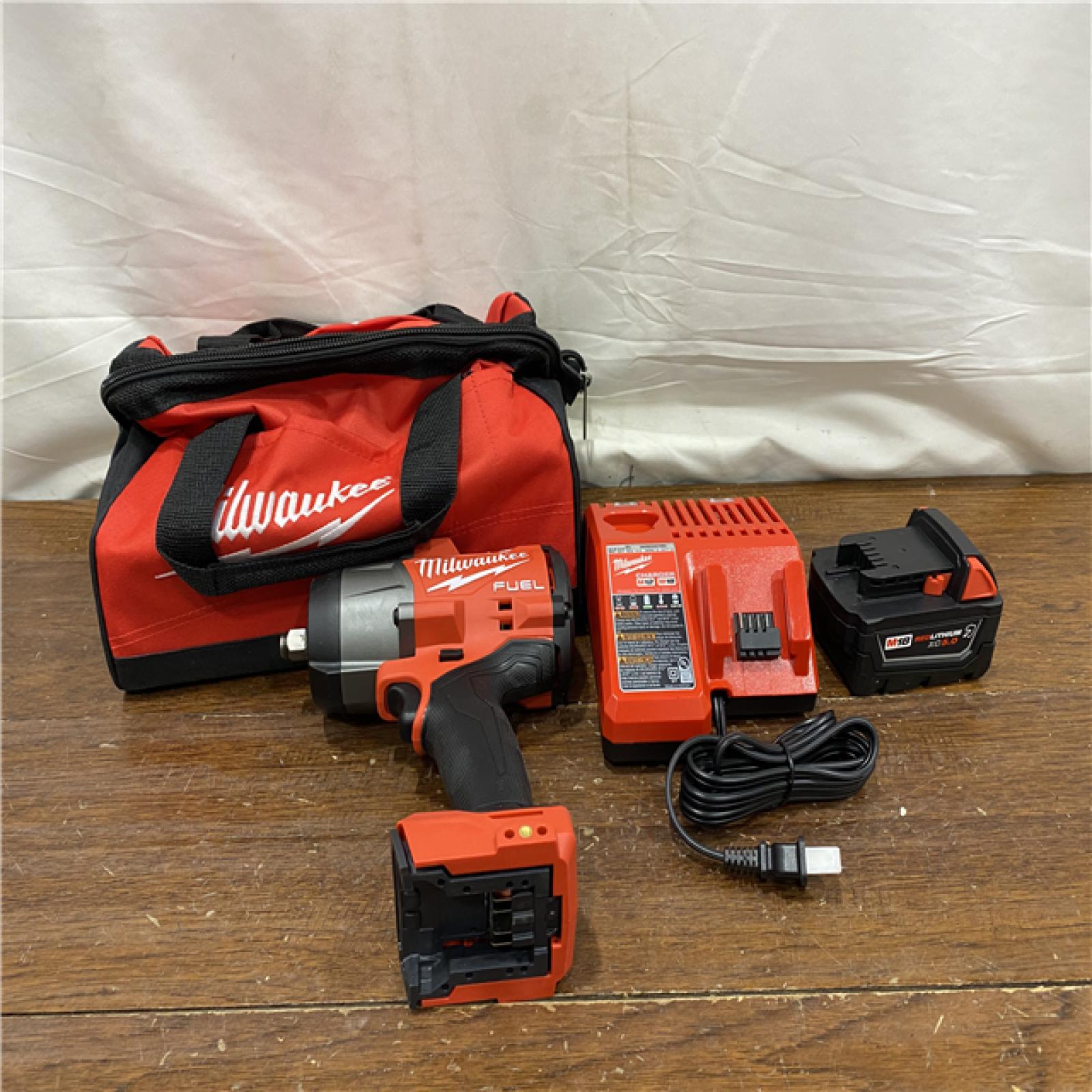 AS-IS Milwaukee M18 1/2 in. Cordless Brushless High Torque Impact Wrench Kit (Battery & Charger)