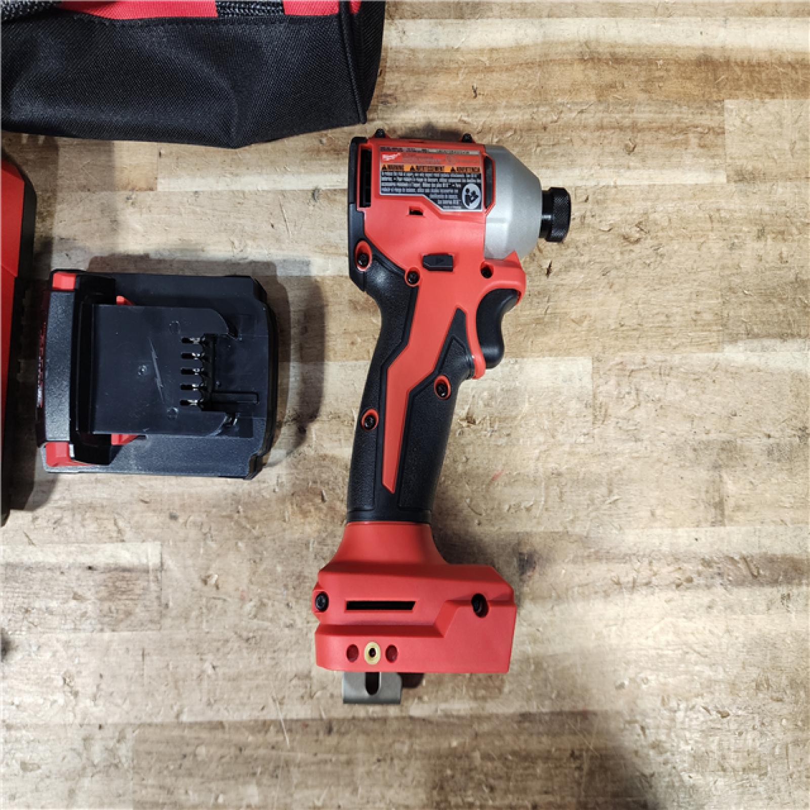 HOUSTON LOCATION - AS - IS Milwaukee 18-Volt Lithium-Ion Compact Brushless Cordless 1/4 in. Impact Driver Kit