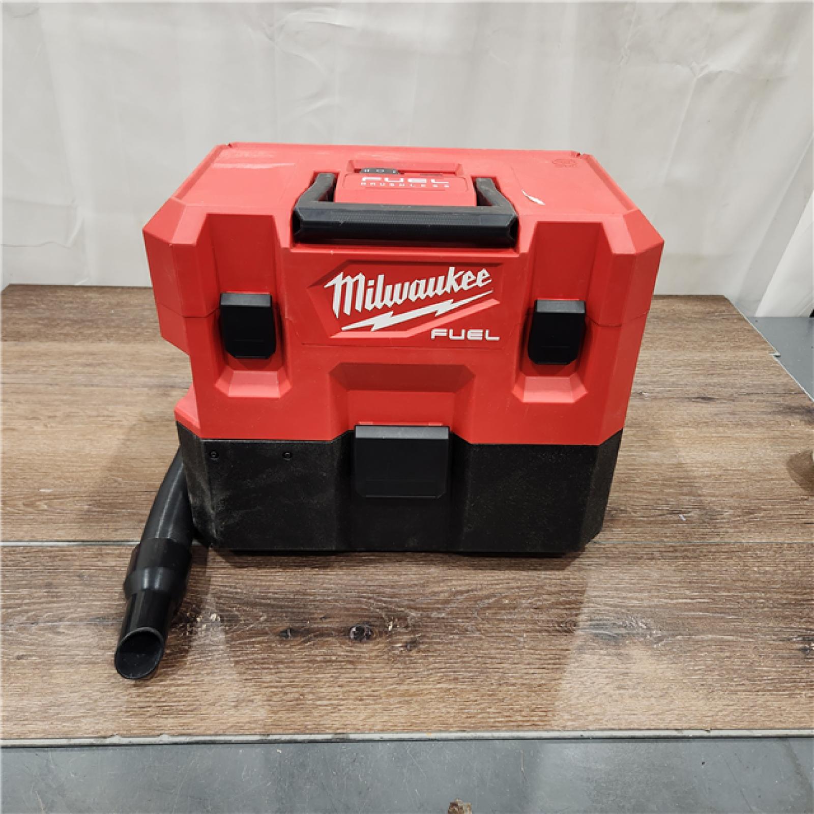 AS-IS Milwaukee M12 FUEL 12-Volt Lithium-Ion Cordless 1.6 Gal. Wet/Dry Vacuum (Tool-Only) and Extra Filter, Reds / Pinks