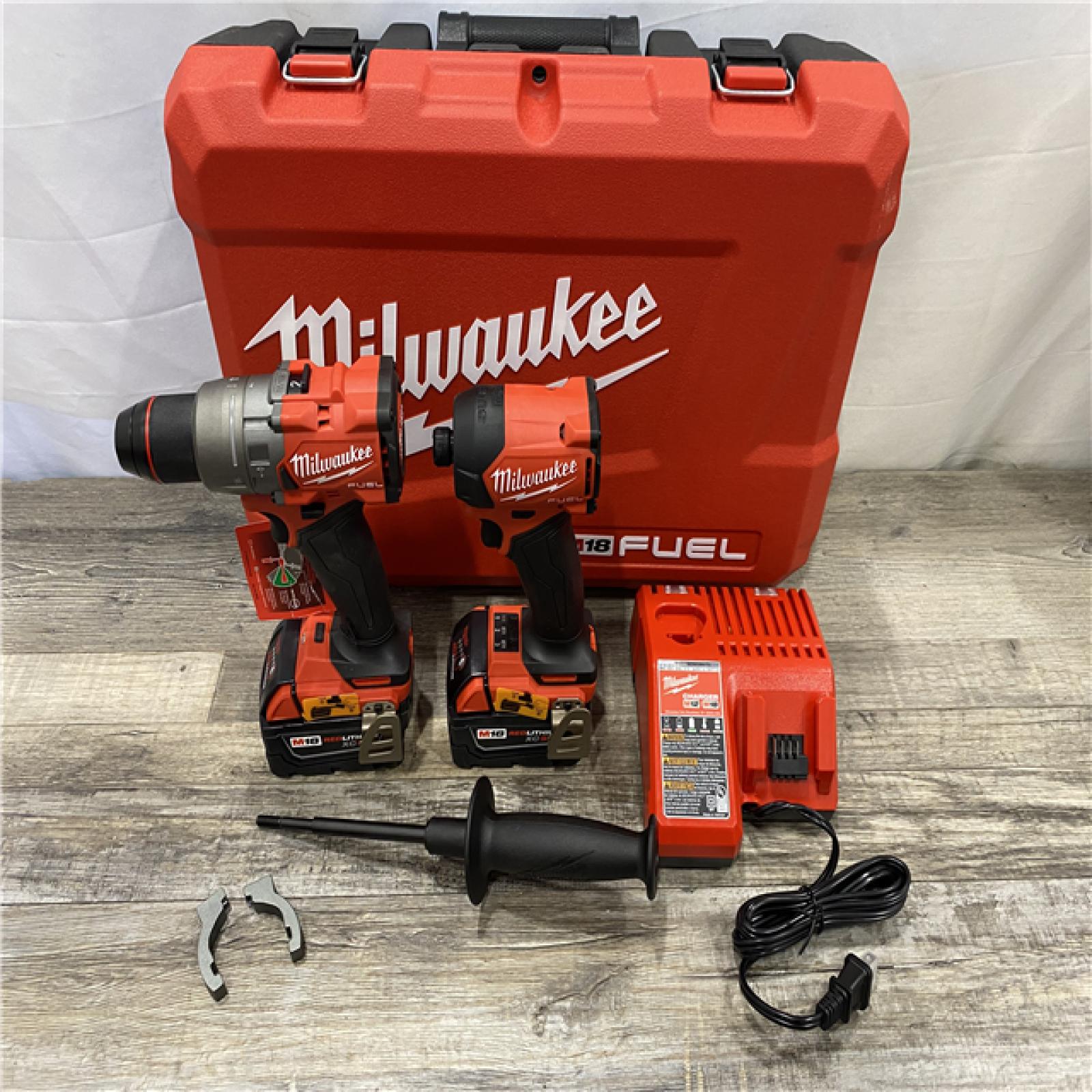 AS-IS Milwaukee FUEL 18V Lithium-Ion Brushless Cordless Hammer Drill & SURGE Impact Driver Combo Kit