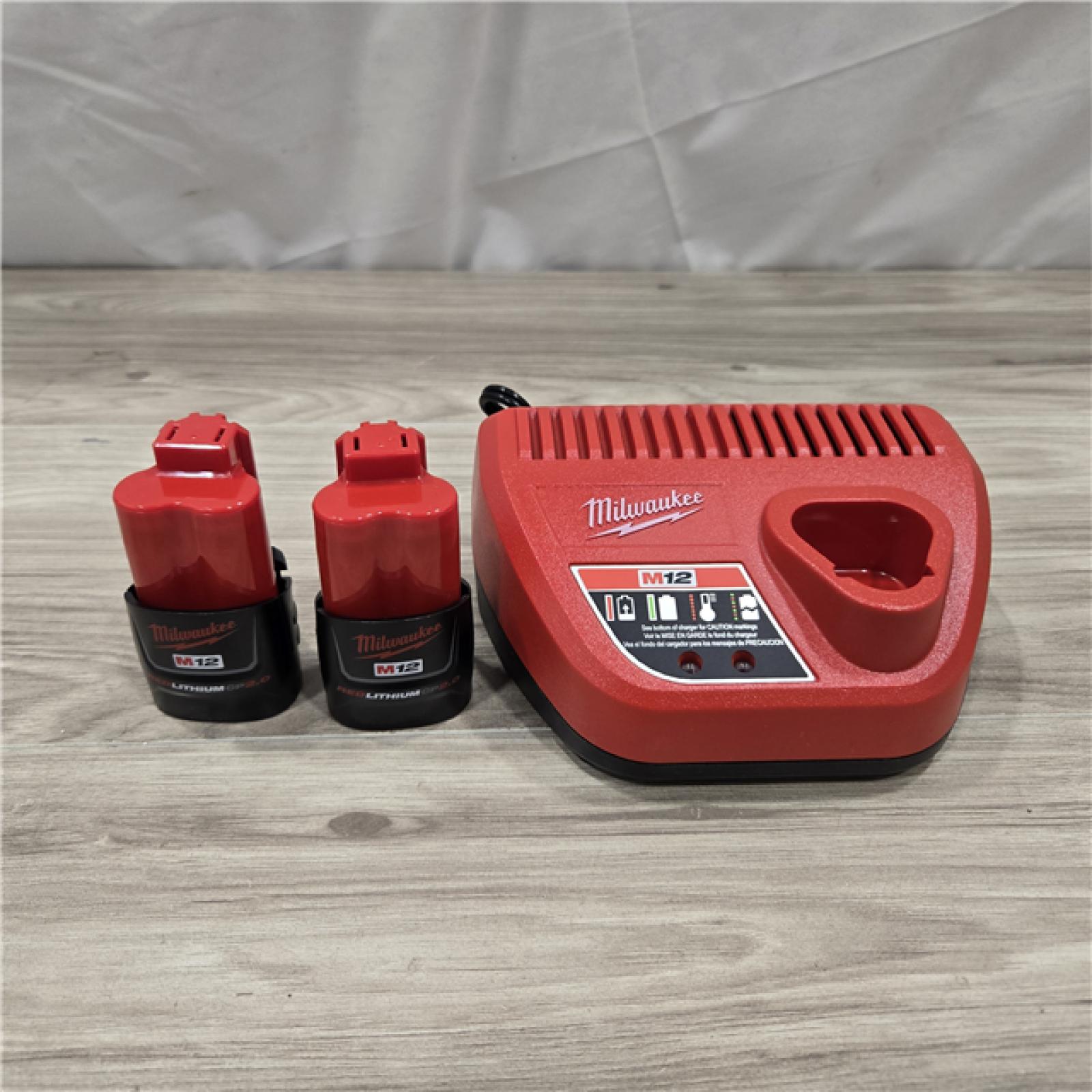 AS-IS Milwaukee M12 12V Lithium-Ion Compact 2.0 Ah Battery Pack Starter Kit