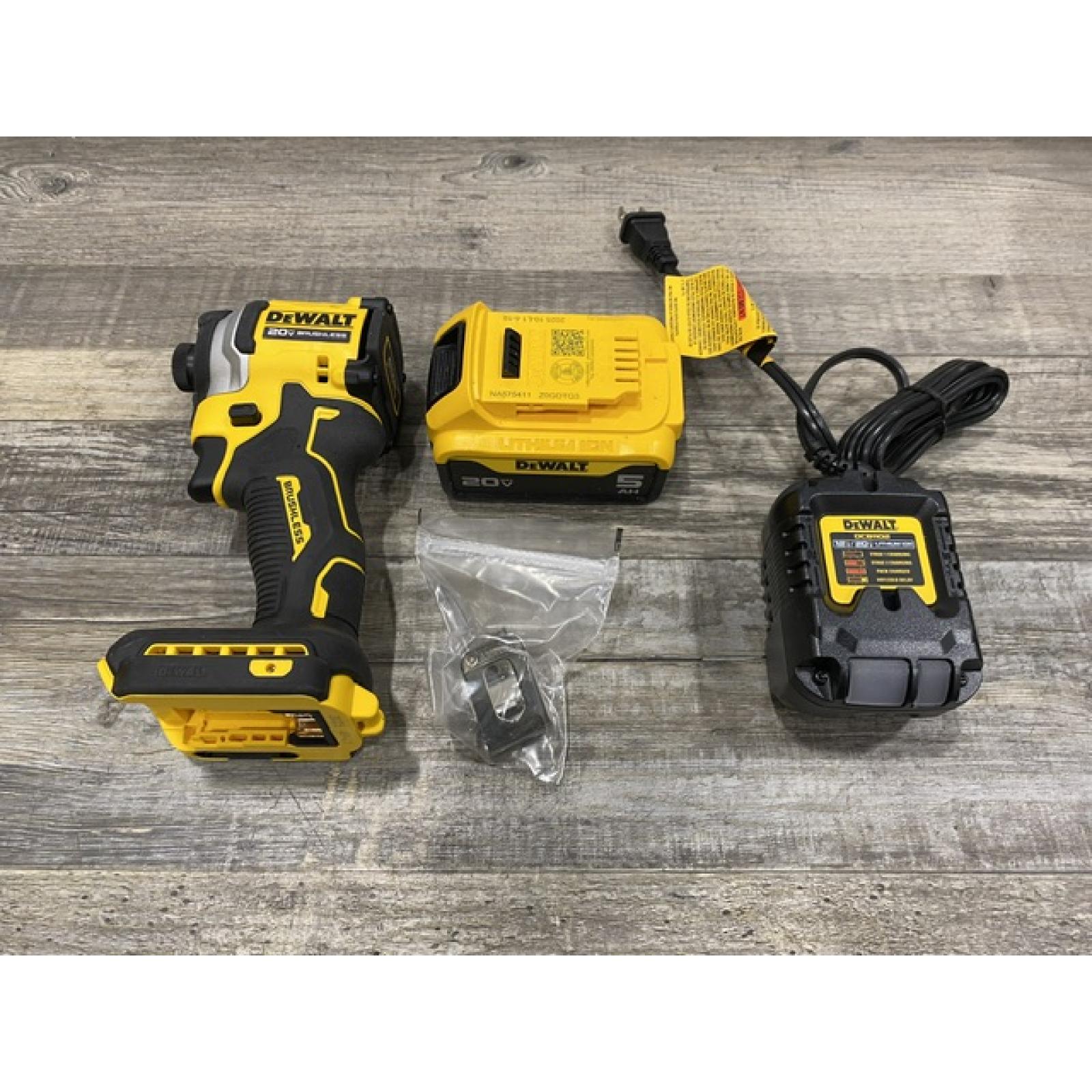AS-IS DEWALT ATOMIC 20V MAX Lithium-Ion Cordless 1/4 in. Brushless Impact Driver Kit