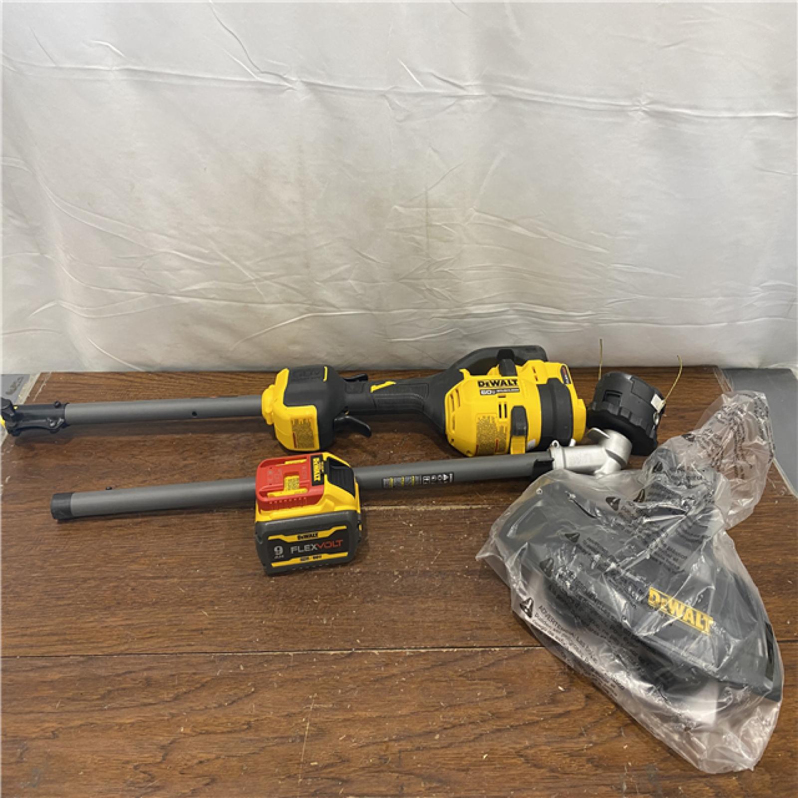 AS-IS DEWALT FLEXVOLT 60V MAX 17 in. Cordless Battery Powered Attachment Capable Trimmer Kit with (1) FLEXVOLT 3 Ah Battery & Charger