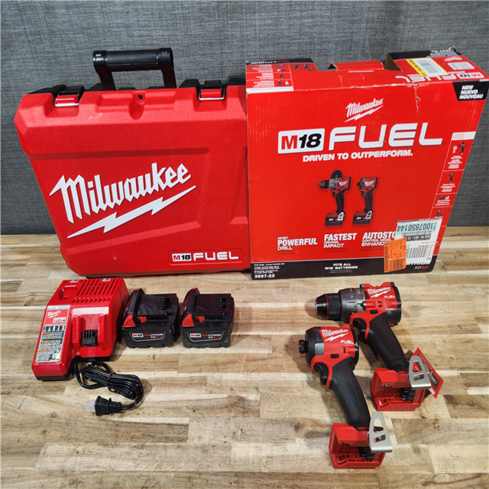 HOUSTON LOCATION - AS-IS (APPEARS LIKE NEW) Milwaukee  FUEL 18V Lithium-Ion Brushless Cordless Hammer Drill and Impact Driver Combo Kit