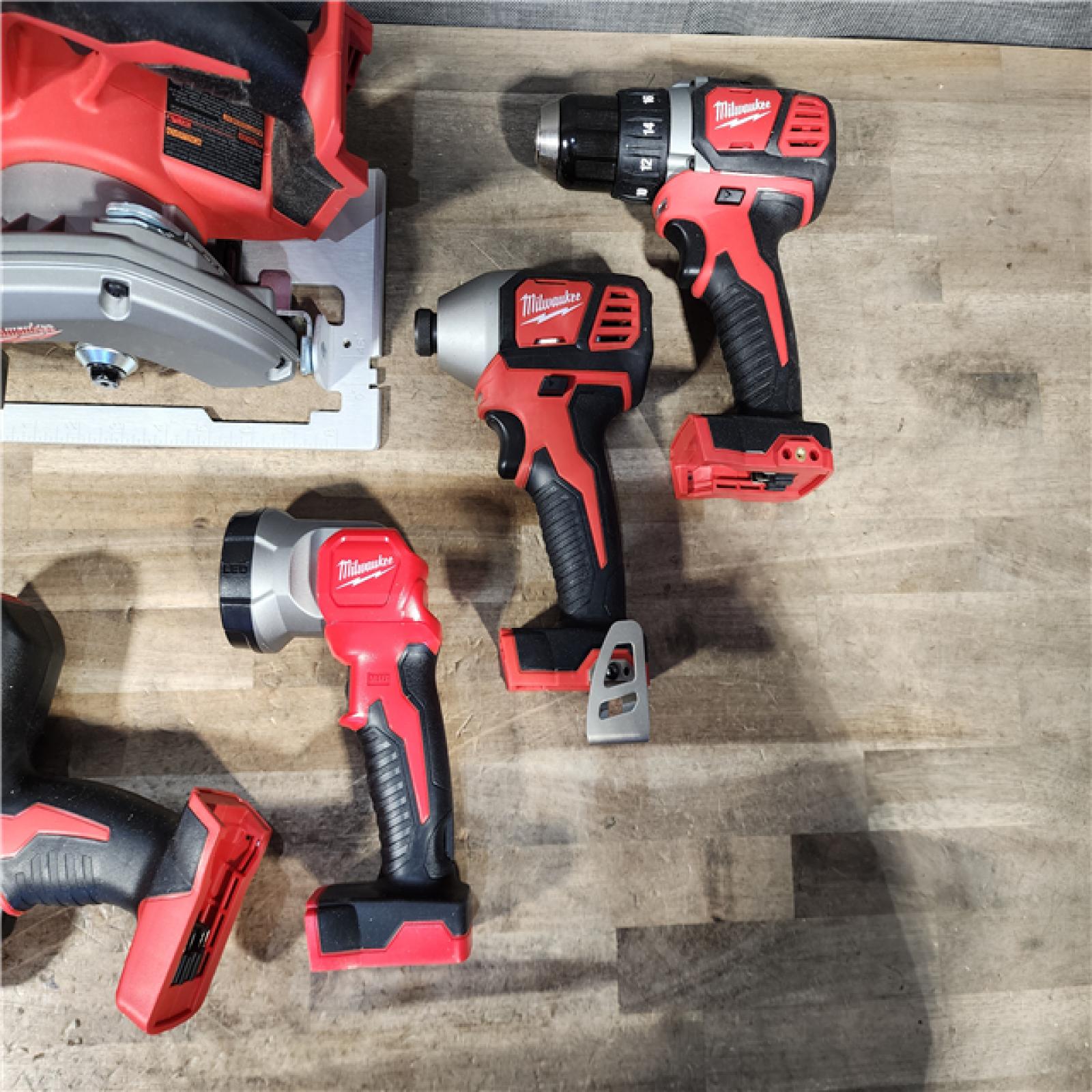 HOUSTON LOCATION - AS-IS MILWAUKEE 5 TOOL COMBO KIT W/ (2) BATTERY & CHARGER