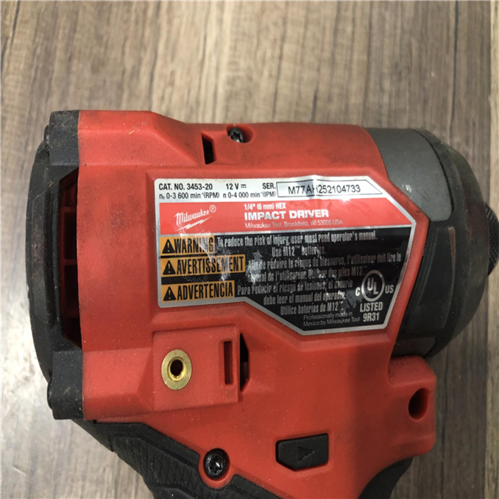 AS-IS Milwaukee  FUEL 12V Lithium-Ion Brushless Cordless 1/4 in. Hex Impact Driver (Tool-Only)