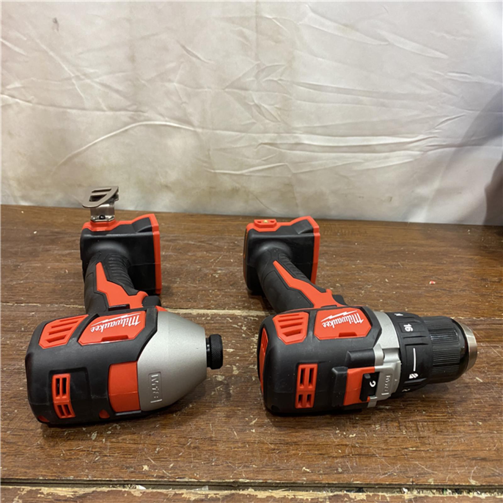AS-IS  Milwaukee 18V Cordless Brushed 2 Tool Drill/Driver and Impact Driver Kit