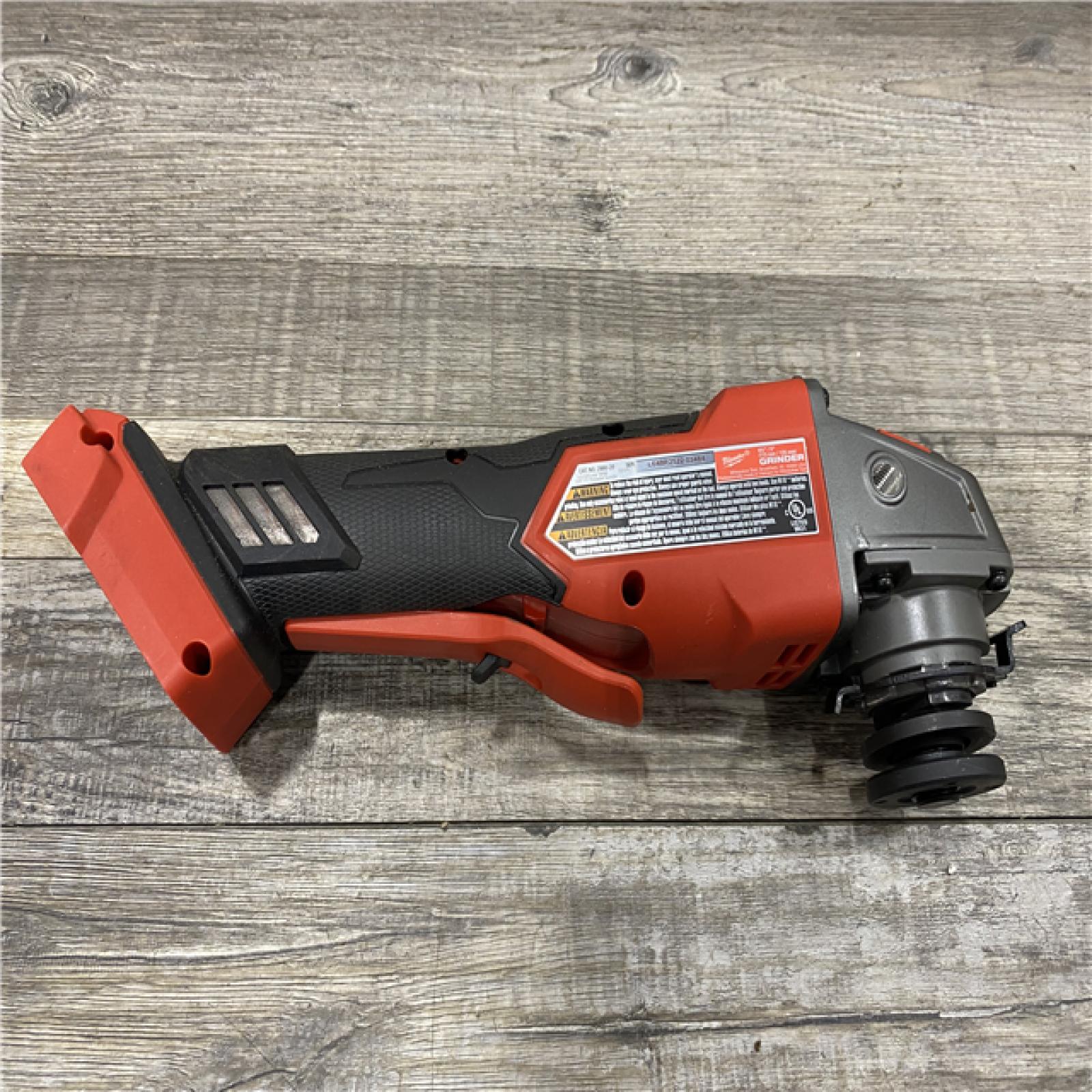 AS-IS Milwaukee FUEL 18V Lithium-Ion Brushless Cordless 4-1/2 in./5 in. Grinder w/Paddle Switch (Tool-Only)