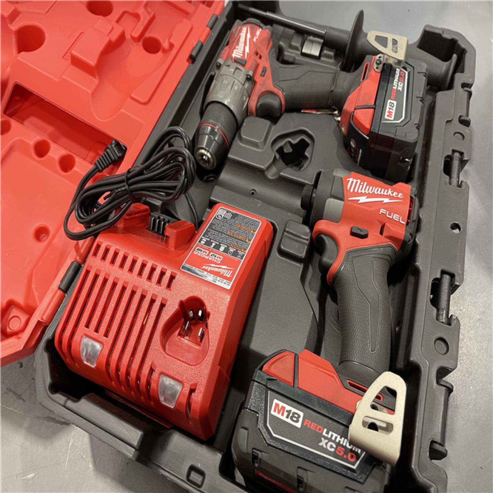 AS-IS - Milwaukee M18 FUEL 18V Lithium-Ion Brushless Cordless Hammer Drill and Impact Driver Combo Kit
