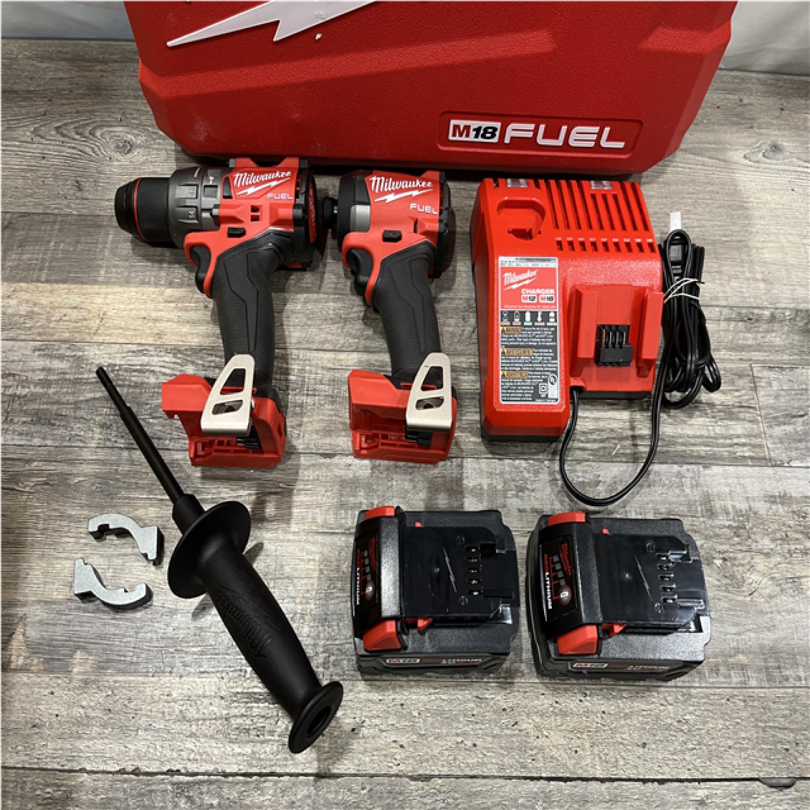 AS-IS Milwaukee FUEL 18V Lithium-Ion Brushless Cordless Hammer Drill and Impact Driver Combo Kit
