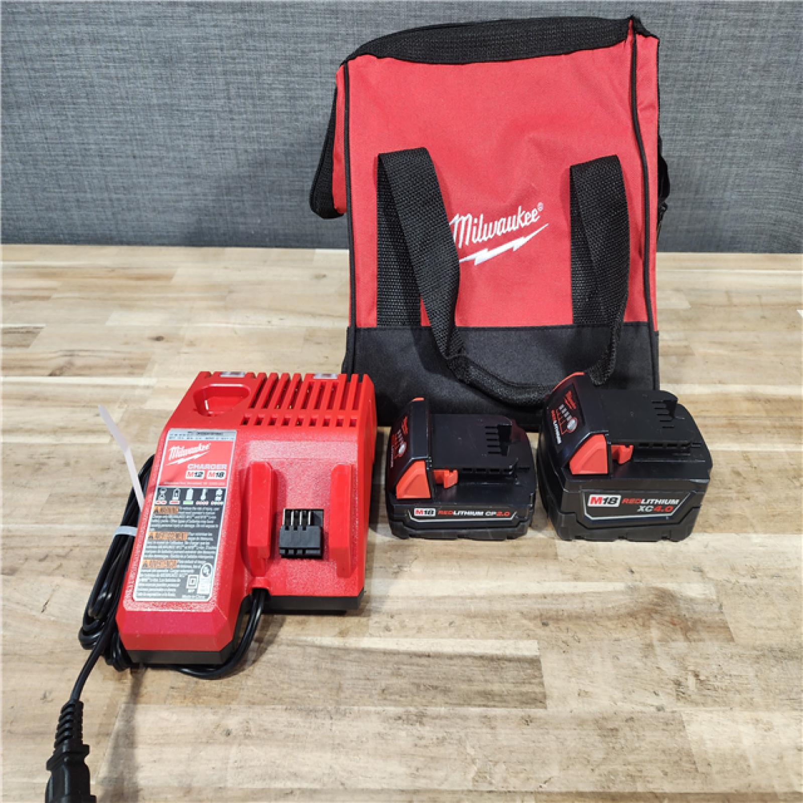 HOUSTON LOCATION - AS-IS Milwaukee 18-Volt Lithium-Ion Brushless Cordless Compact Hammer Drill/Impact Combo Kit