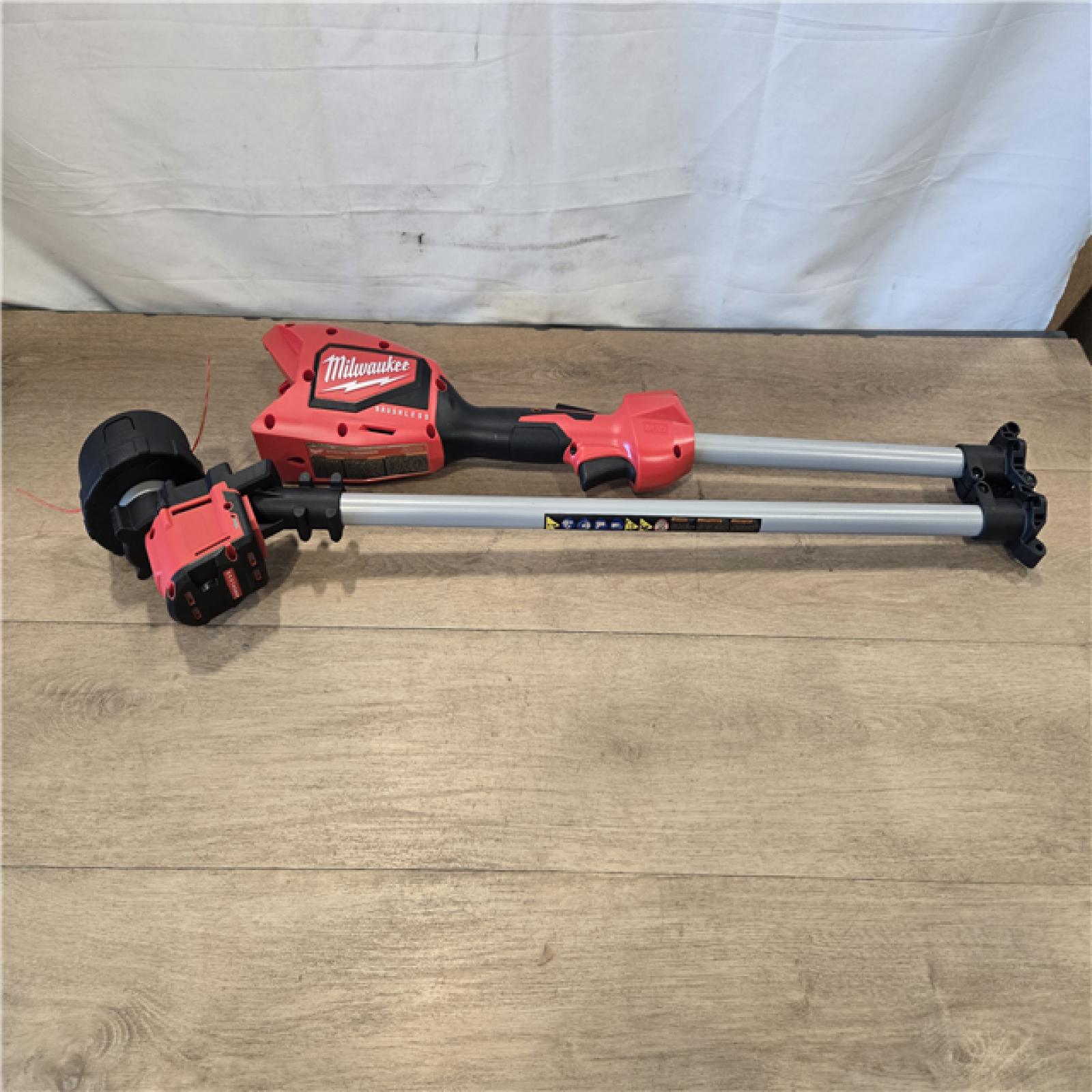 AS-IS Milwaukee M18 Battery String Trimmer Kit