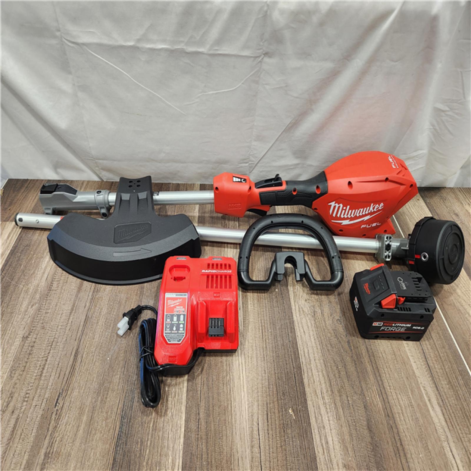 AS-IS- M18 FUEL 18V 16 in. Brushless Cordless Battery Powered String Trimmer W/QUIK-LOK Attachment Capability & 8.0 Ah Battery