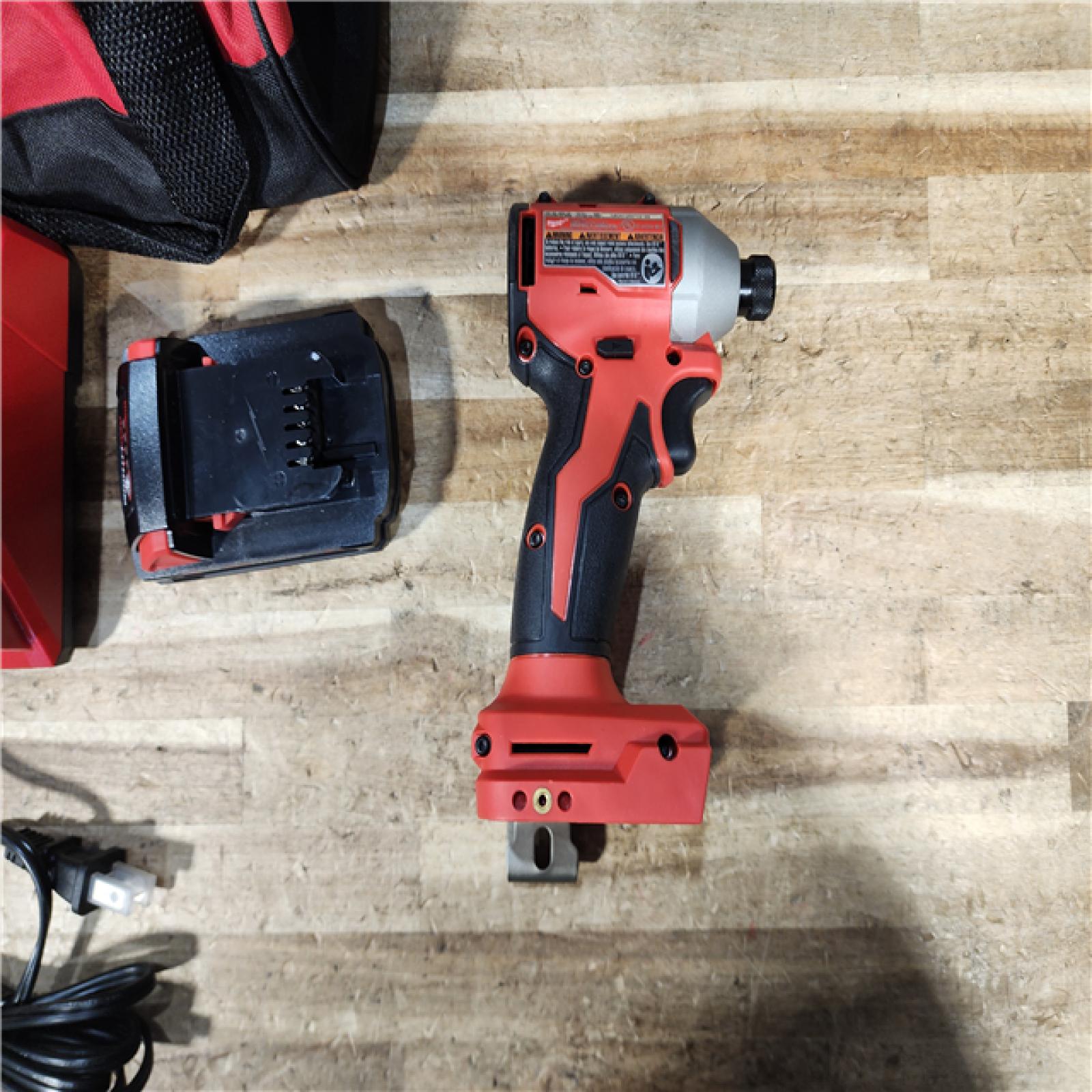HOUSTON LOCATION - AS - IS Milwaukee 18-Volt Lithium-Ion Compact Brushless Cordless 1/4 in. Impact Driver Kit