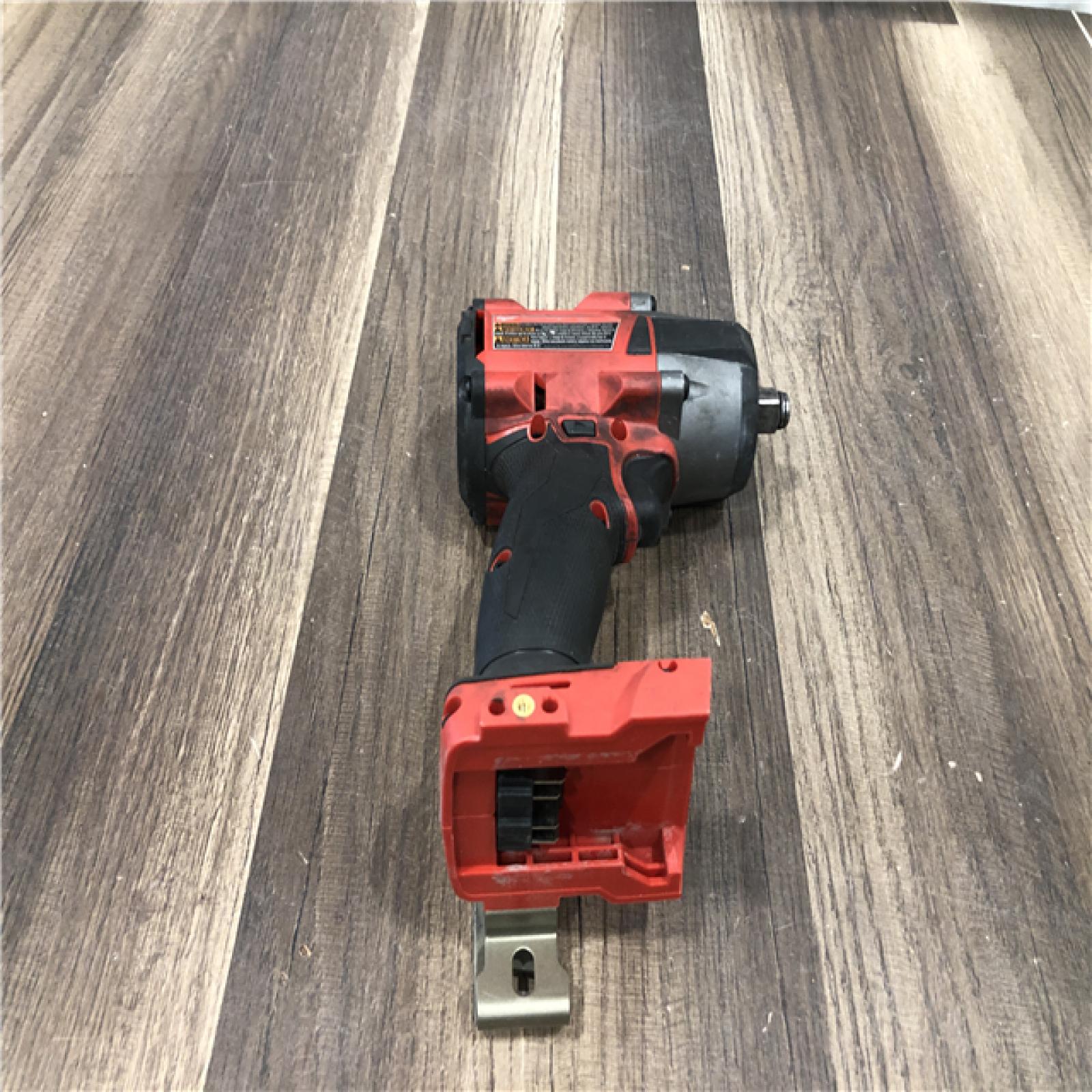 AS-IS Milwaukee FUEL Gen-2 18V Lithium-Ion Brushless Cordless Mid Torque 1/2 in. Impact Wrench w/Friction Ring (Tool-Only)