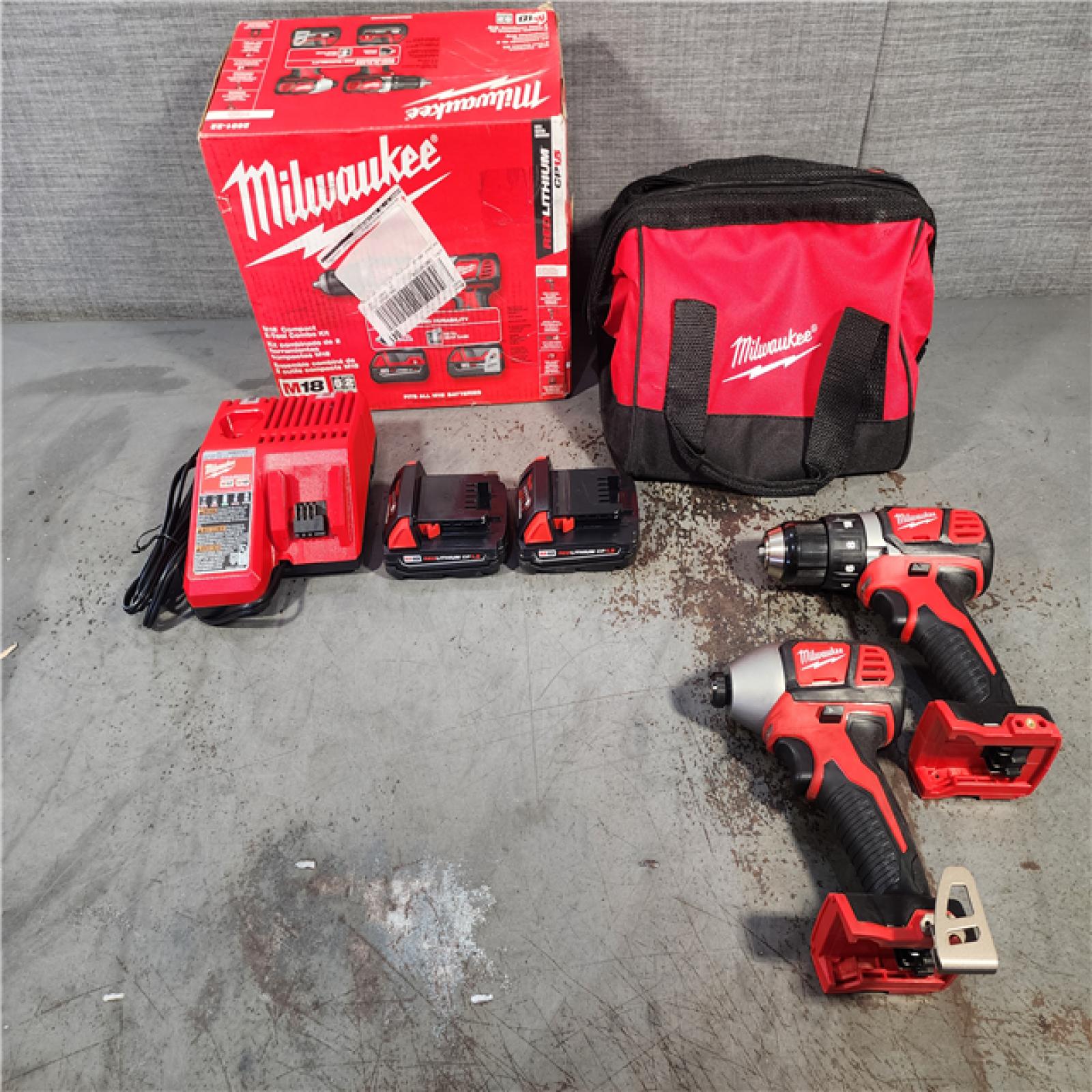 HOUSTON LOCATION - AS-IS Milwaukee M18 18V Cordless Brushed 2 Tool Drill/Driver and Impact Driver Kit