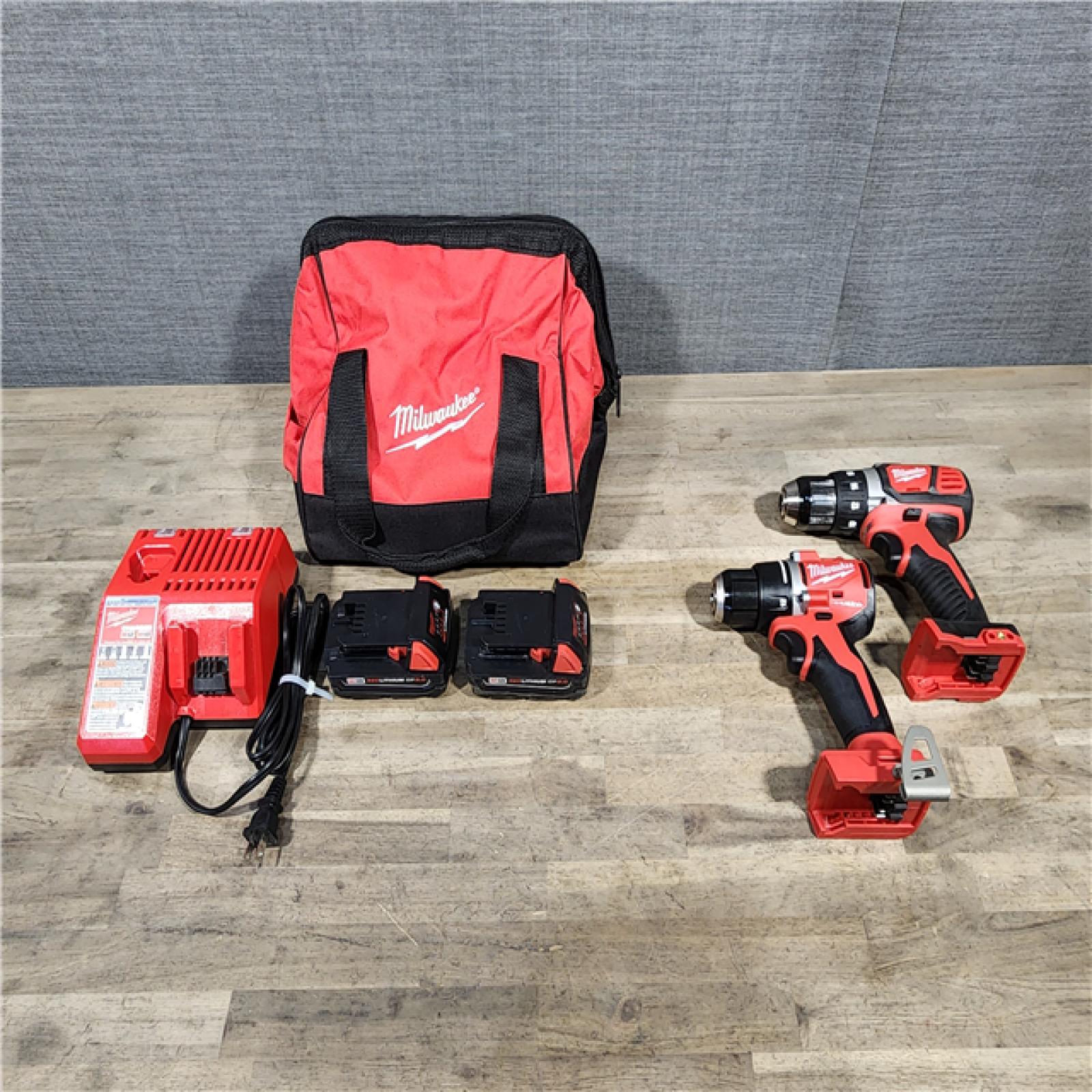 HOUSTON LOCATION - AS-IS MILWAUKEE 2 TOOL COMBO KIT W/ (2) BATTERY & CHARGER