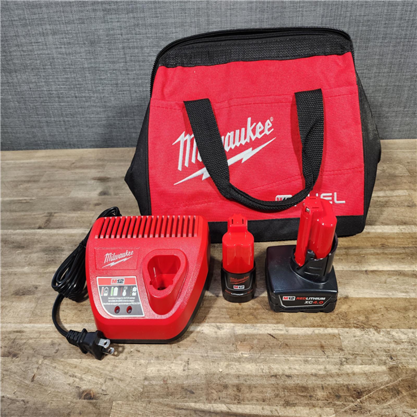 HOUSTON LOCATION - AS-IS Milwaukee FUEL 12-Volt Lithium-Ion Brushless Cordless Hammer Drill and Impact Driver Combo Kit