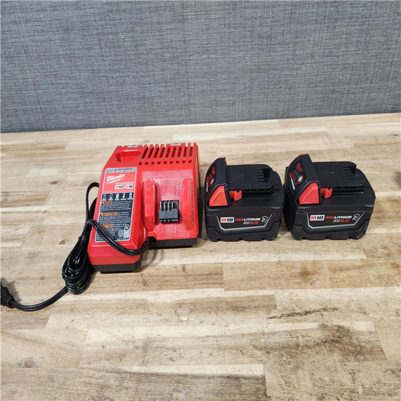HOUSTON LOCATION - AS-IS MILWAUKEE 2 TOOL COMBO KIT W/ (2) BATTERY & CHARGER