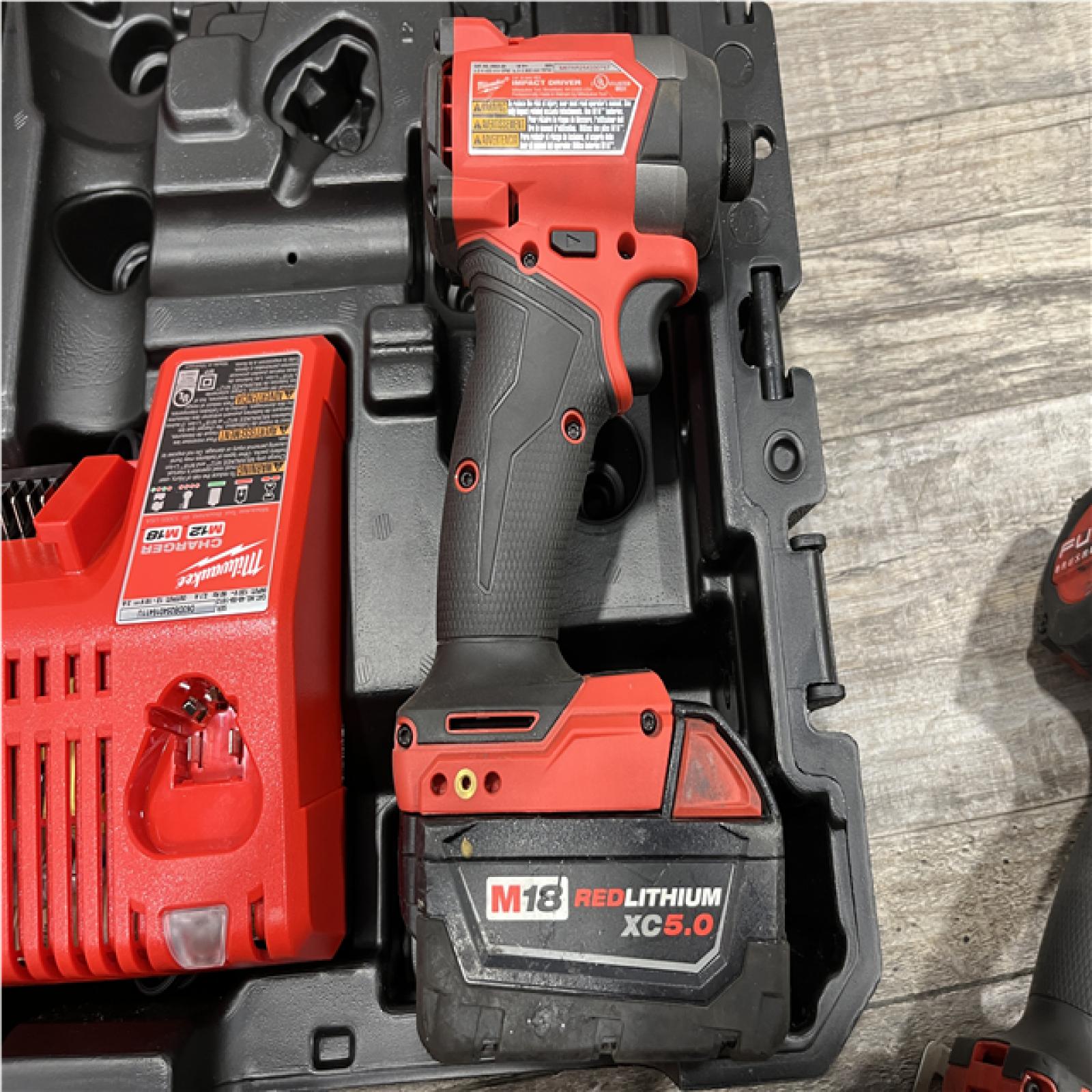 AS-IS Milwaukee FUEL 18V Lithium-Ion Brushless Cordless Hammer Drill and Impact Driver Combo Kit