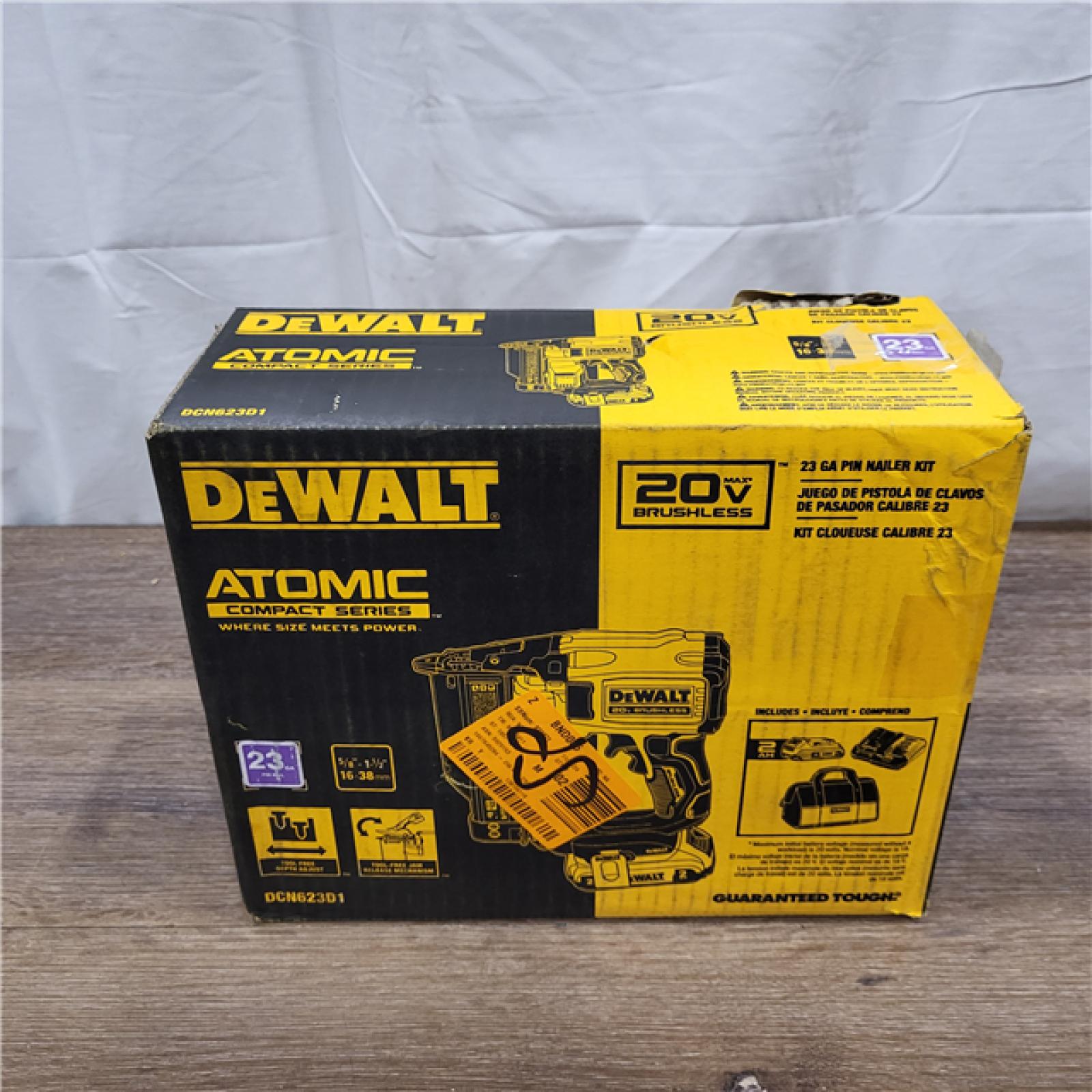 AS-IS DEWALT ATOMIC 20V MAX Lithium Ion Cordless 23 Gauge Pin Nailer Kit with 2.0Ah Battery and Charger
