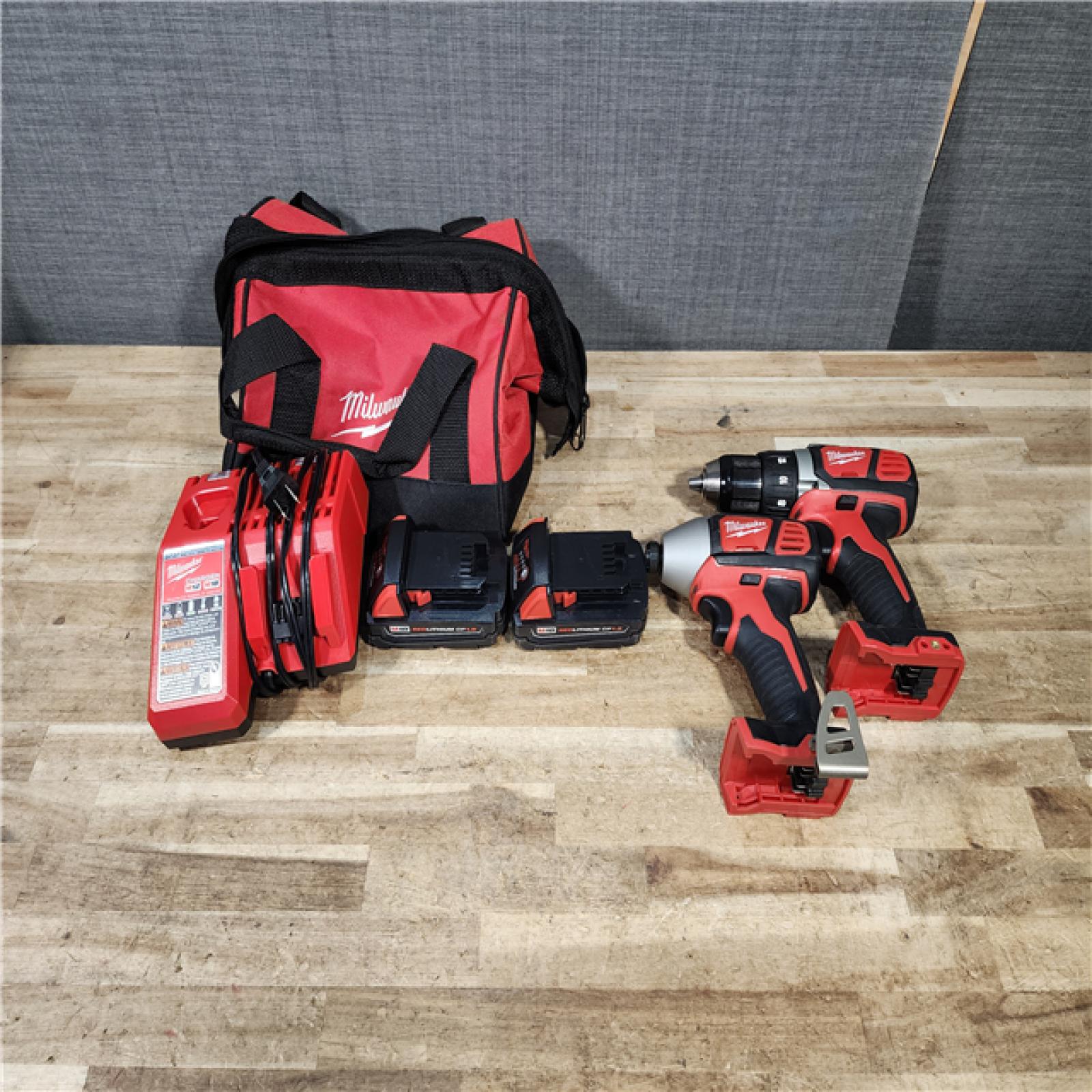 HOUSTON LOCATION - AS - IS Milwaukee 18V Lithium-Ion Cordless Drill Driver/Impact Driver Combo Kit