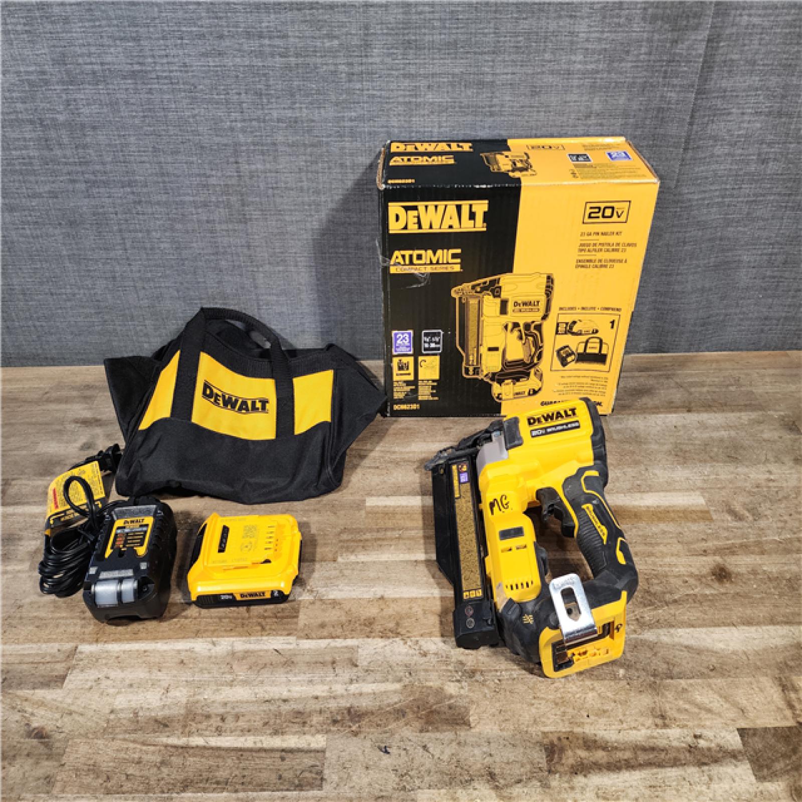 HOUSTON LOCATION - AS-IS DEWALT ATOMIC 20V MAX Lithium Ion Cordless 23 Gauge Pin Nailer Kit