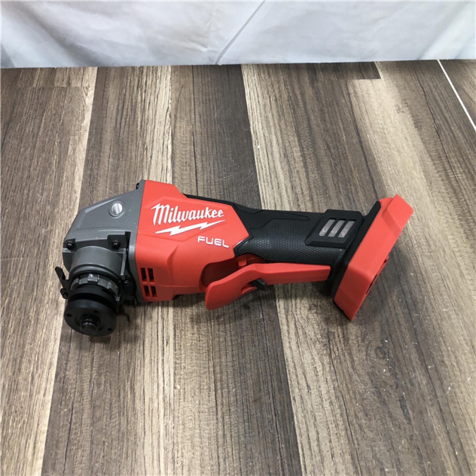 AS-IS Milwaukee FUEL 18V Lithium-Ion Brushless Cordless 4-1/2 in./5 in. Grinder w/Paddle Switch (Tool-Only)