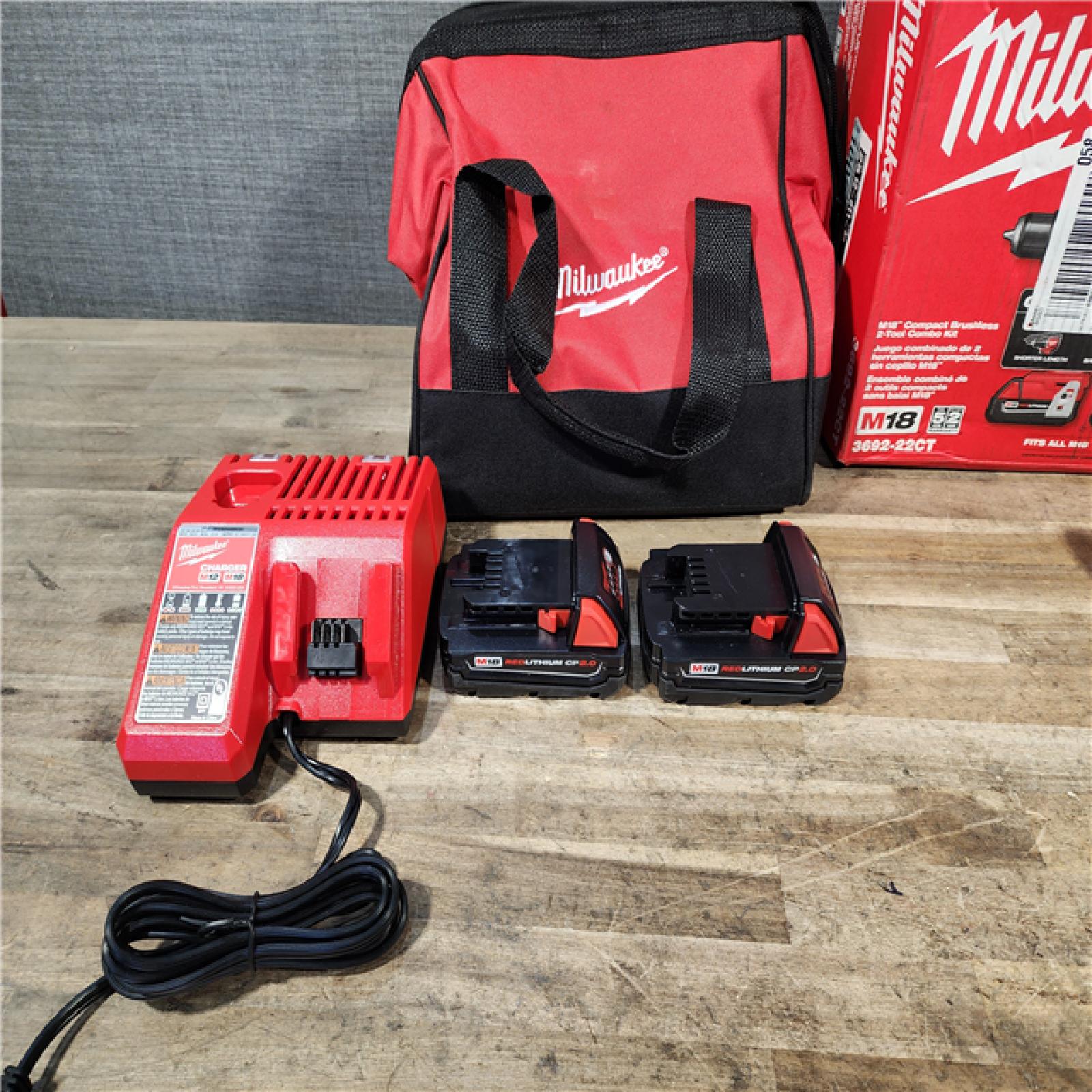 HOUSTON LOCATION - AS-IS Milwaukee M18 18V Lithium-Ion Brushless Cordless Compact Drill/Impact Combo Kit (2-Tool) W/(2) 2.0 Ah Batteries  Charger & Bag