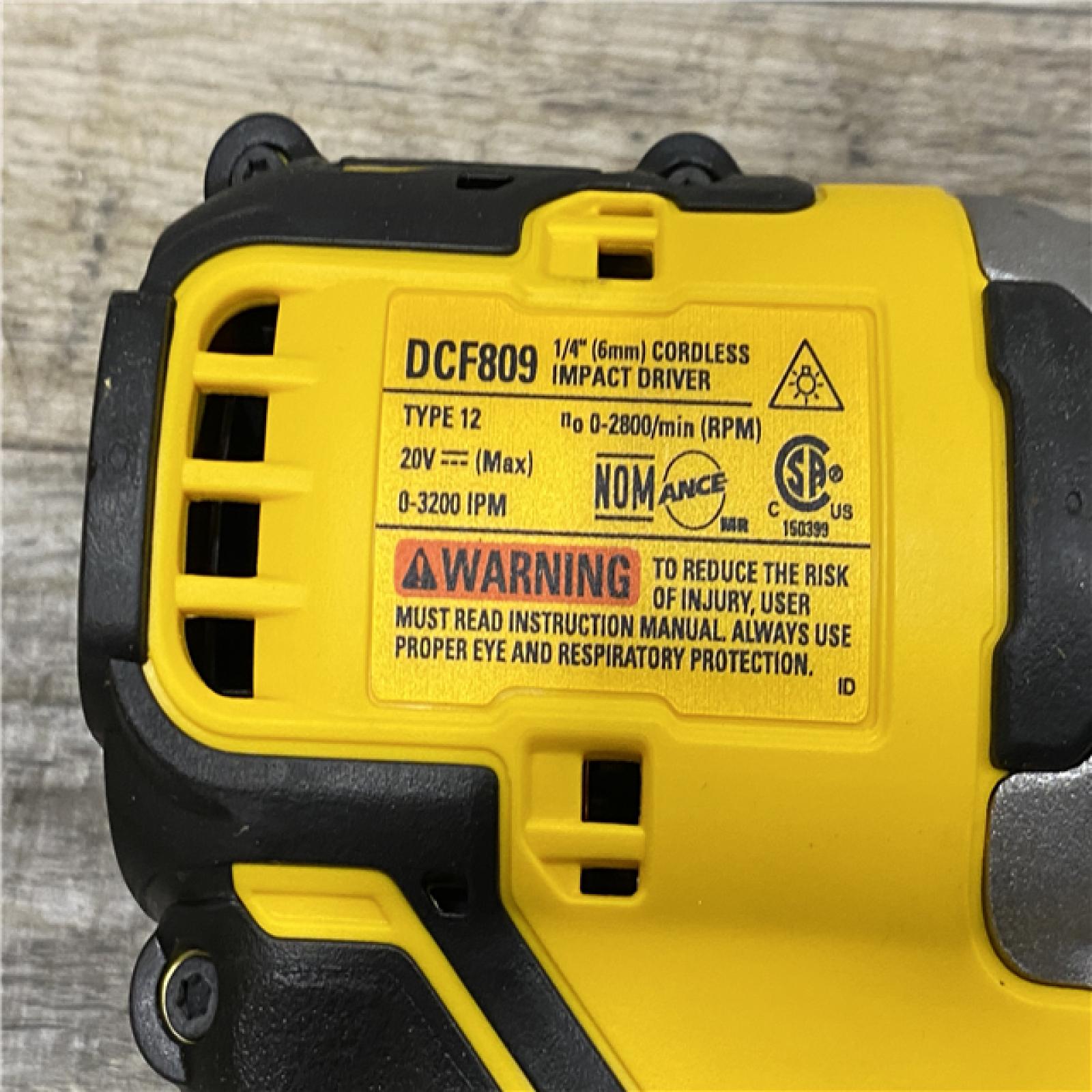 AS-IS DEWALT Atomic 20V Max Lithium-Ion Brushless Cordless Compact 1/4 in. Impact Driver Kit