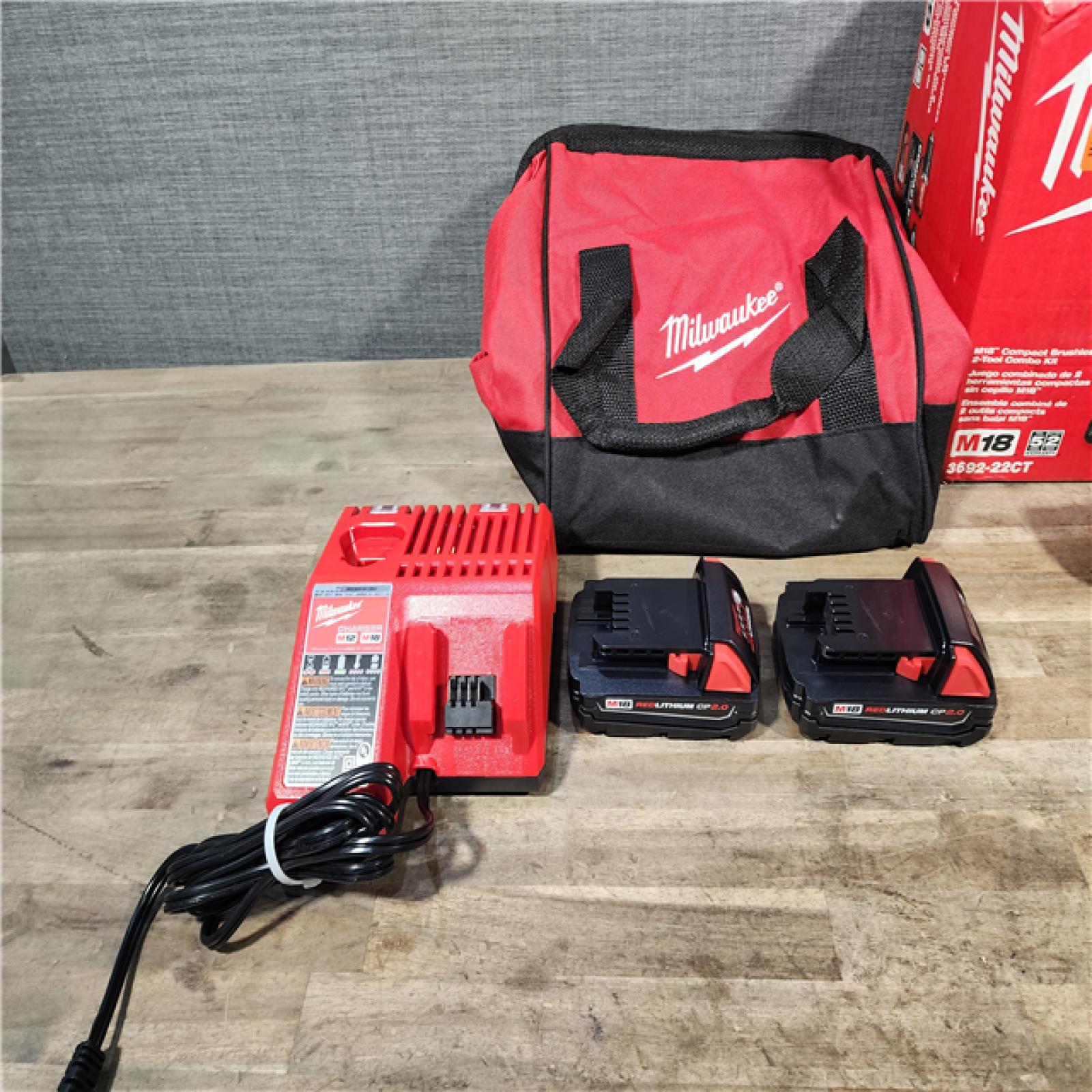 HOUSTON LOCATION - AS-IS Milwaukee M18 18V Lithium-Ion Brushless Cordless Compact Drill/Impact Combo Kit (2-Tool) W/(2) 2.0 Ah Batteries  Charger & Bag
