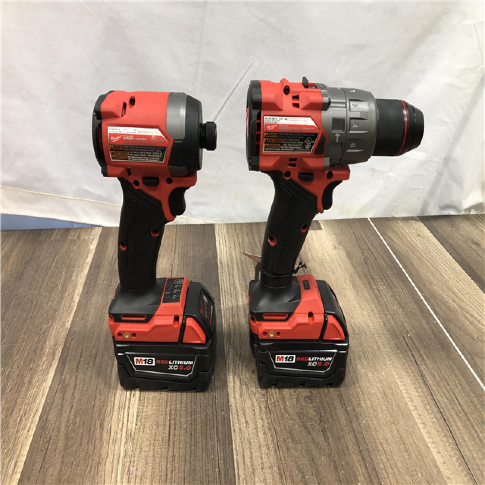 AS-IS Milwaukee FUEL 18V Lithium-Ion Brushless Cordless Hammer Drill and Impact Driver Combo Kit
