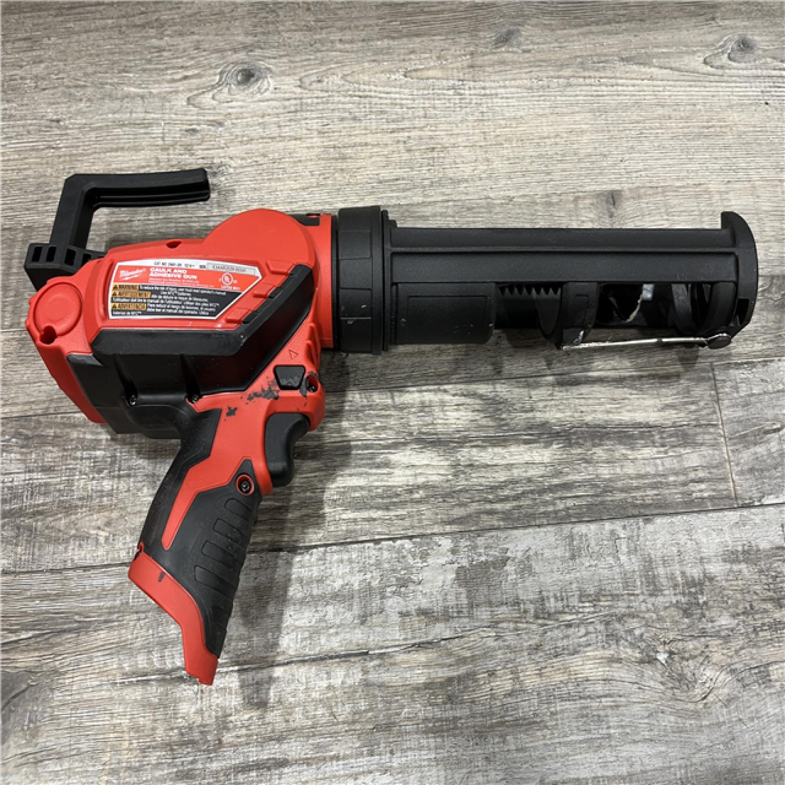 AS-IS Milwaukee 12V Lithium-Ion Cordless 10 oz. Adhesive and Caulk Gun (Tool-Only)