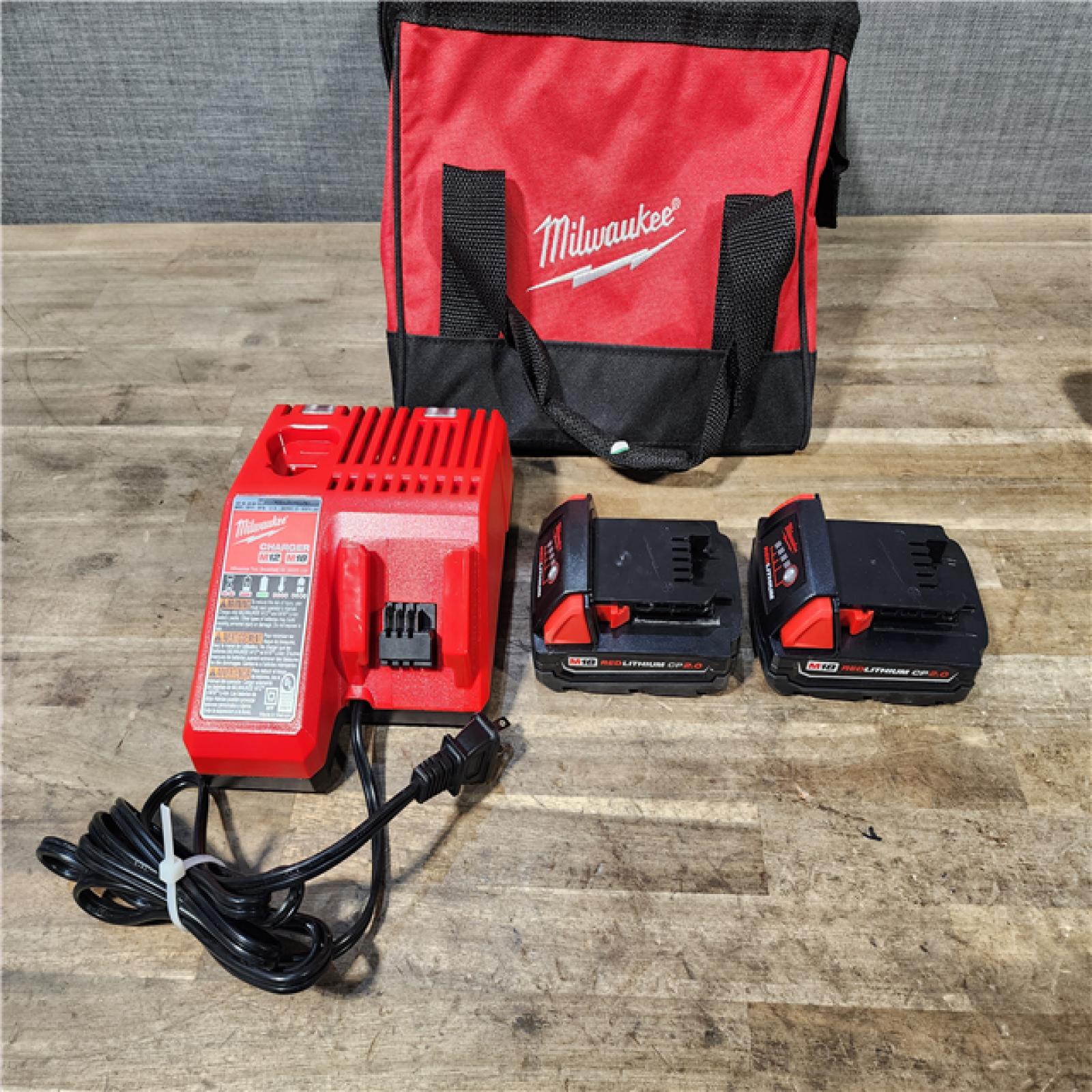 HOUSTON LOCATION - AS-IS Milwaukee 18V Cordless Brushed 2-Tool Drill/Driver and Impact Driver Kit