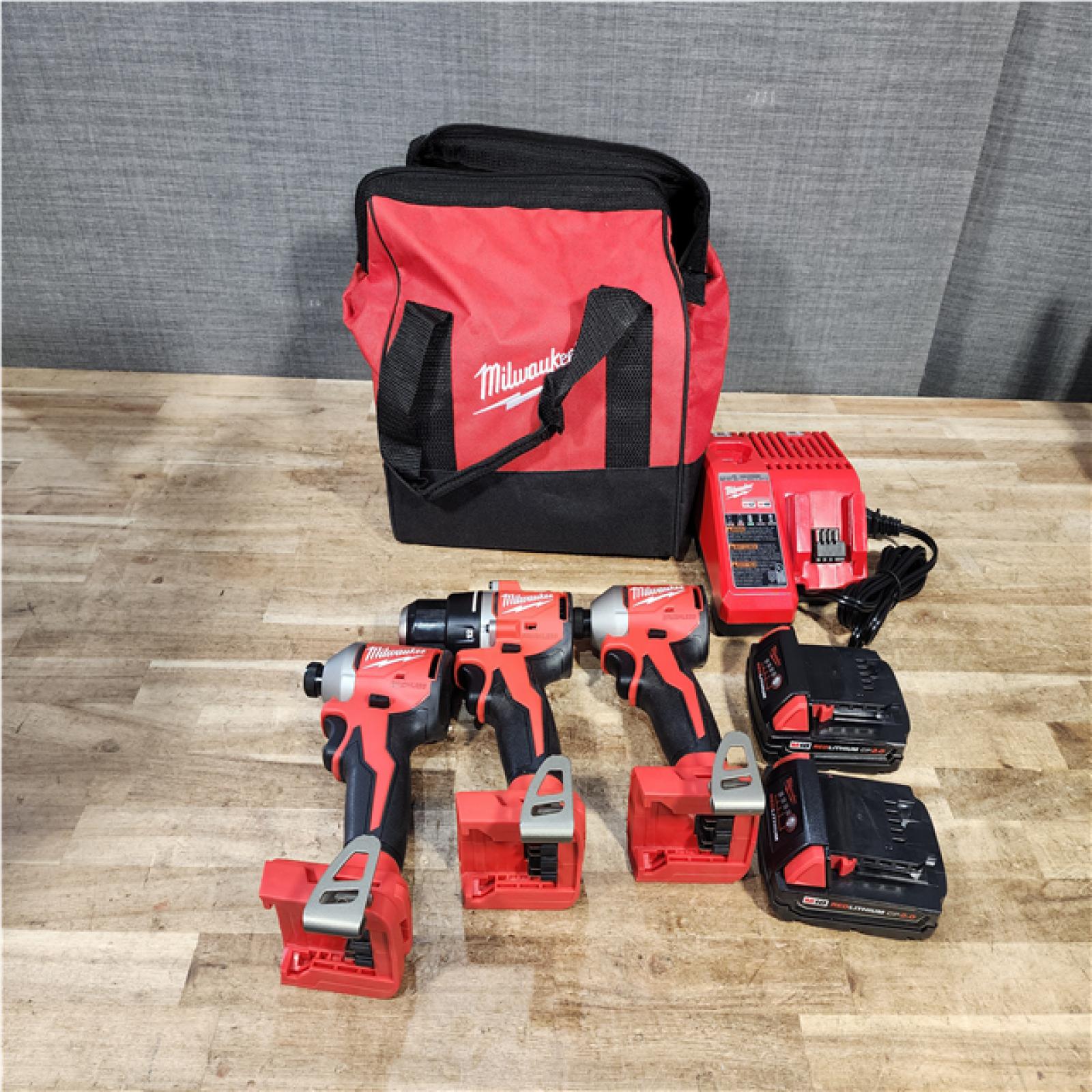 Houston Location AS-IS Milwaukee Drill and Impacts QTY/2 and Batteries QTY/2 and Charger