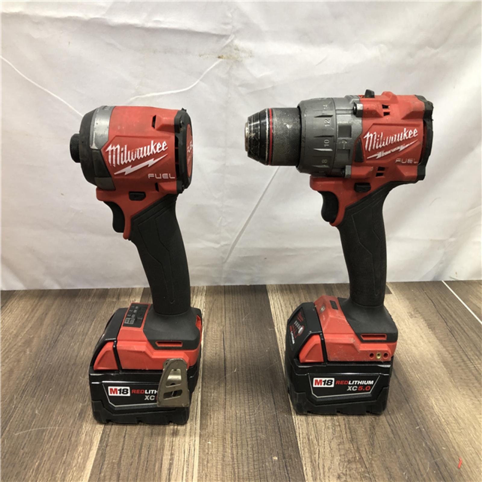 AS-IS Milwaukee FUEL 18V Lithium-Ion Brushless Cordless Hammer Drill and Impact Driver Combo Kit