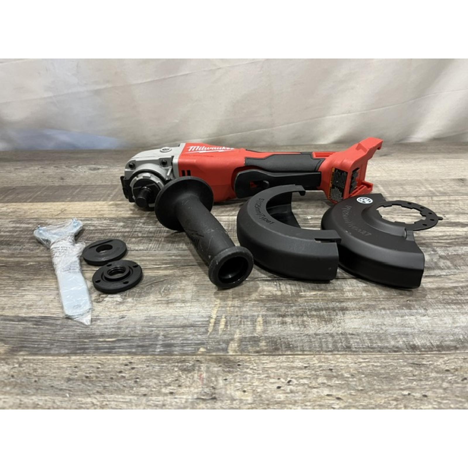 AS-IS Milwaukee 18V Lithium-Ion Brushless Cordless 4-1/2 in./5 in. Grinder w/Paddle Switch (Tool-Only)