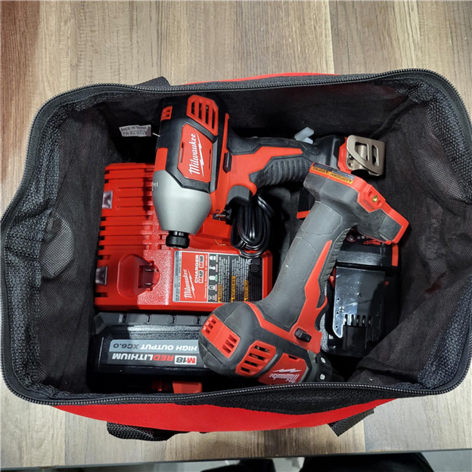 AS IS Milwaukee M18 18V Cordless Brushed 2 Tool Drill/Driver and Impact Driver Kit