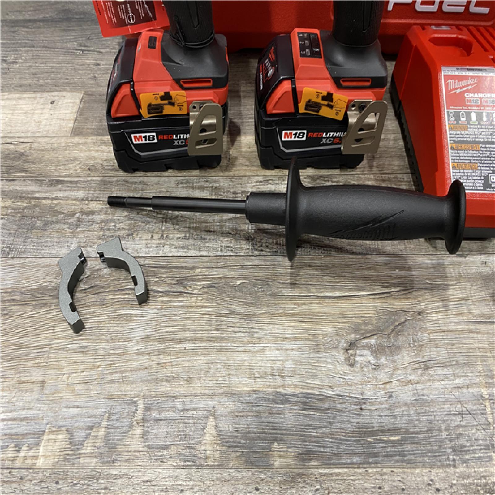 AS-IS Milwaukee FUEL 18V Lithium-Ion Brushless Cordless Hammer Drill & SURGE Impact Driver Combo Kit