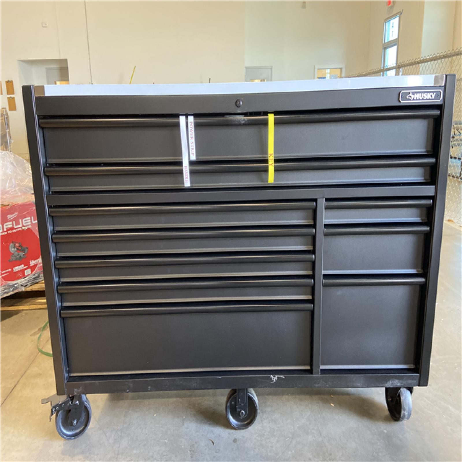 DALLAS LOCATION - Husky Modular Tool Storage 62 in. W X 24 in. D Heavy Duty Matte Black Mobile Workbench Cabinet with Stainless Steel Top