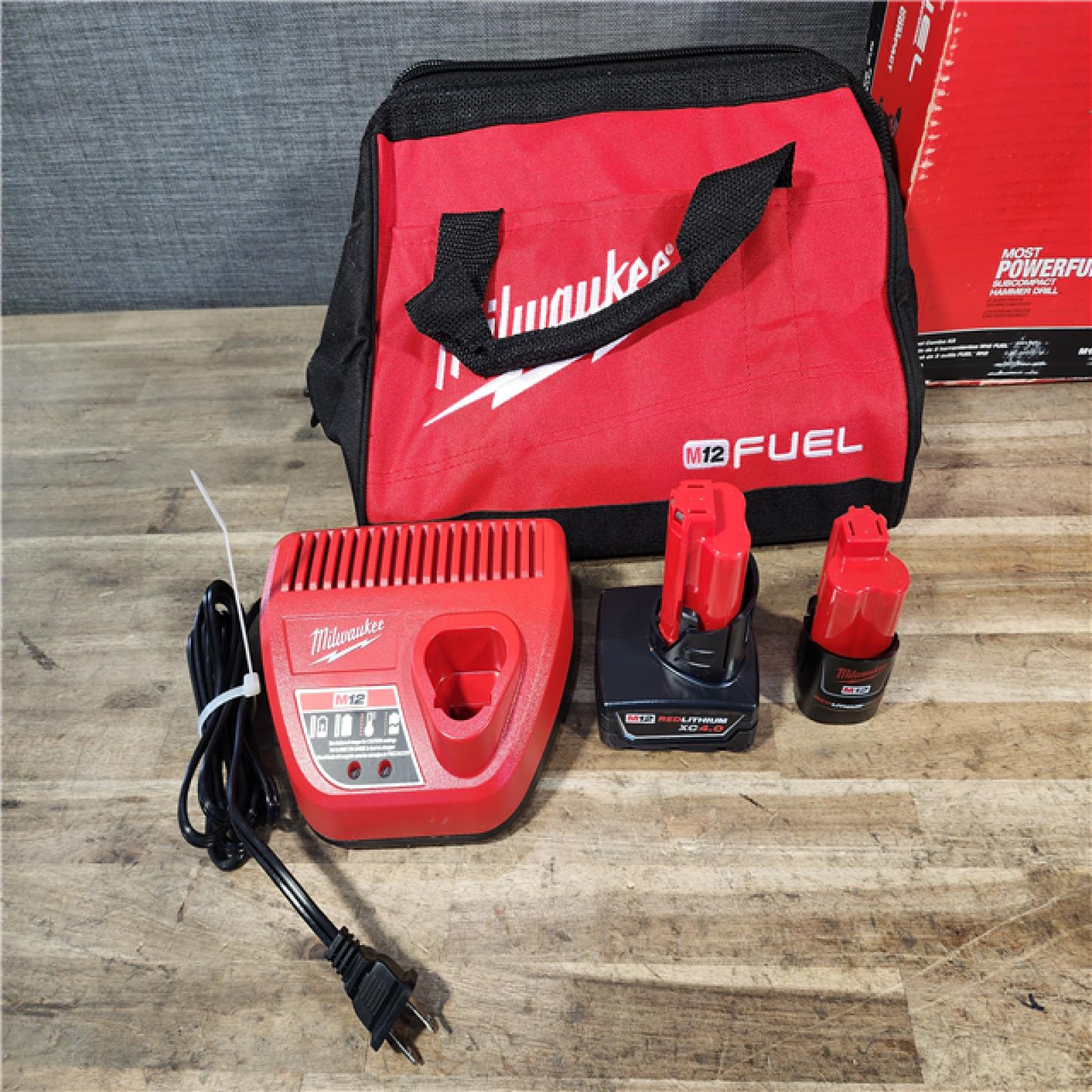 HOUSTON LOCATION - AS-IS Milwaukee FUEL 12-Volt Lithium-Ion Brushless Cordless Hammer Drill and Impact Driver Combo Kit