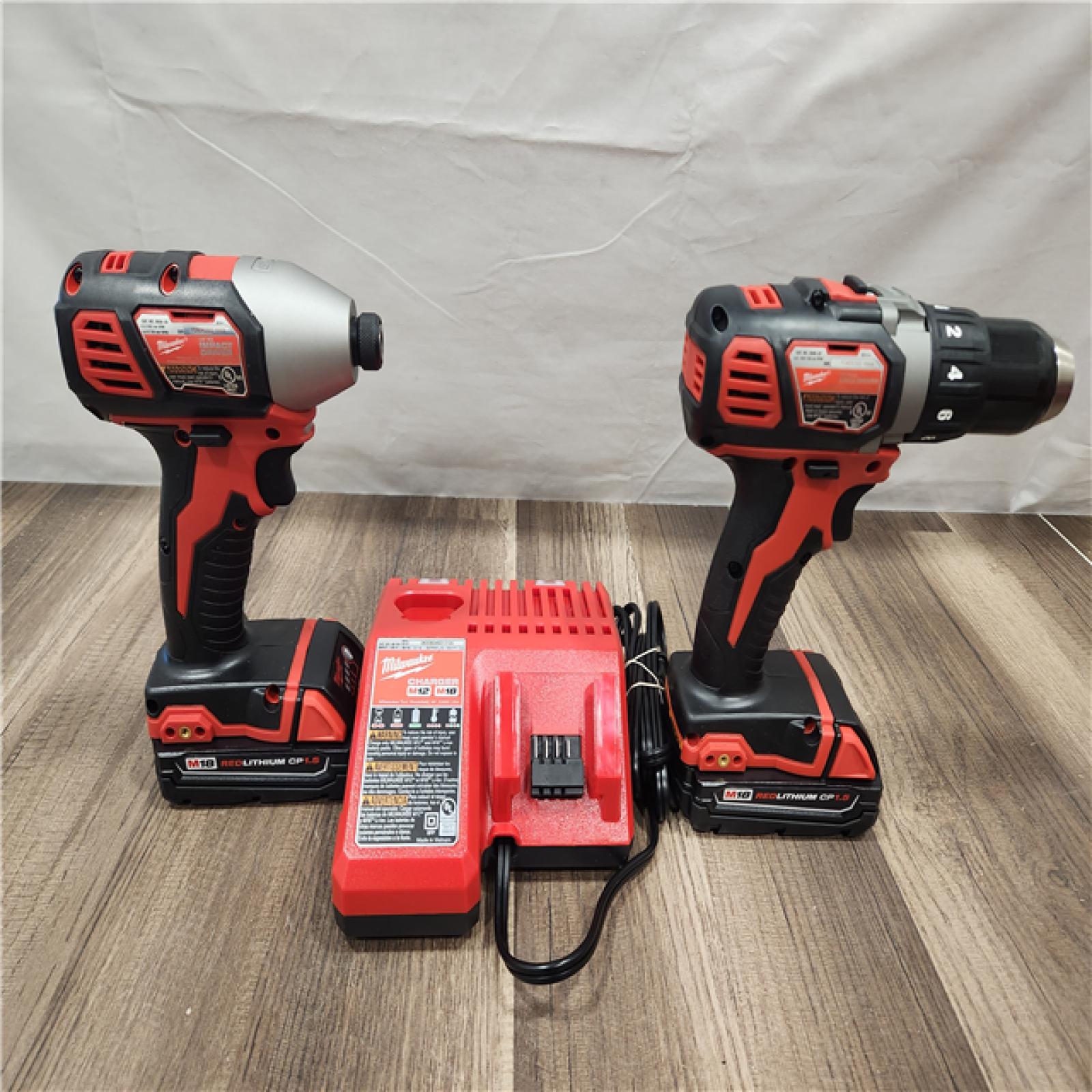 AS-IS- Milwaukee 18V Cordless Brushed 2-Tool Drill/Driver and Impact Driver Kit