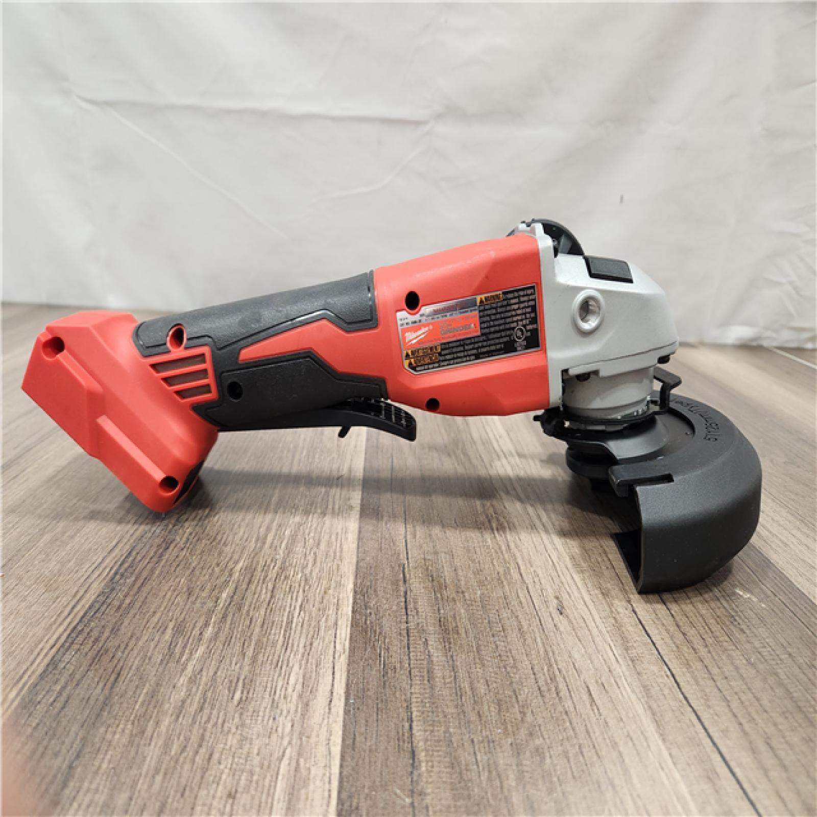 AS-IS- Milwaukee18V Cordless 4.5 /5  Grinder W/ Paddle Switch (Tool Only)