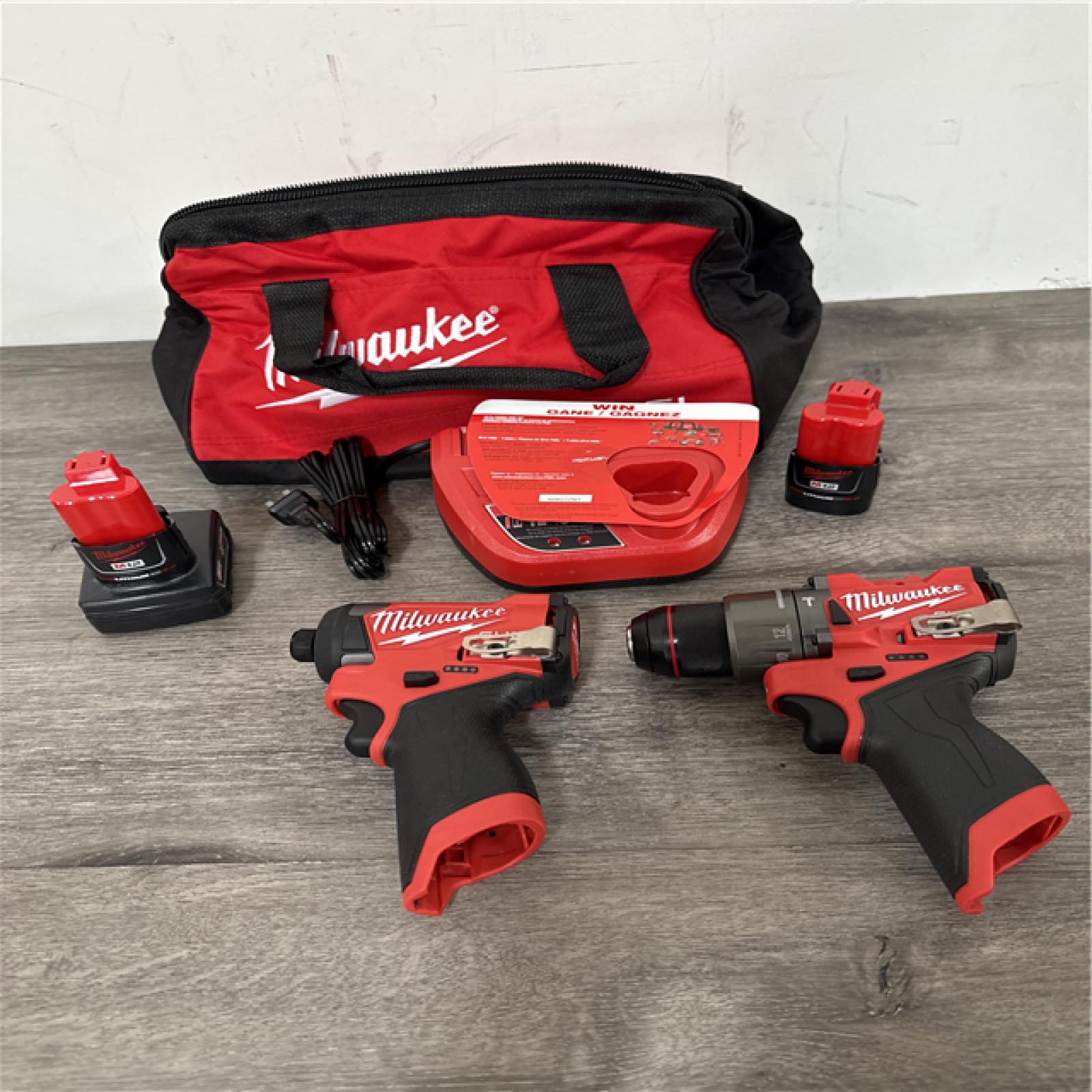 CALIFORNIA AS-IS Milwaukee 2-Tool Combo Kit  Includes (2) Batteries  Charger & Bag; Appears in Excellent Conditin