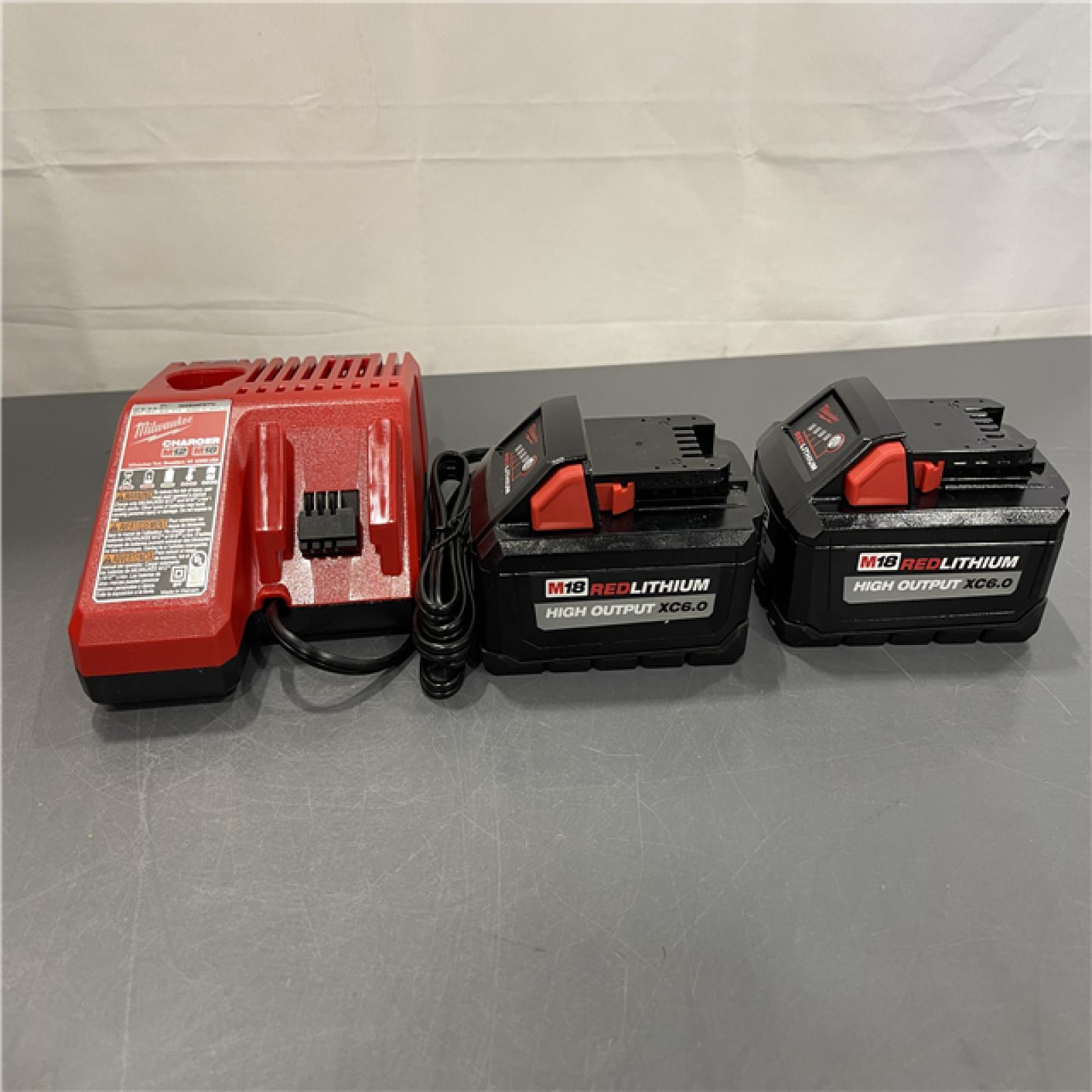 AS-IS - Milwaukee 18-Volt Lithium-Ion High Output Starter Kit with Two 6.0 Ah Battery and Charger