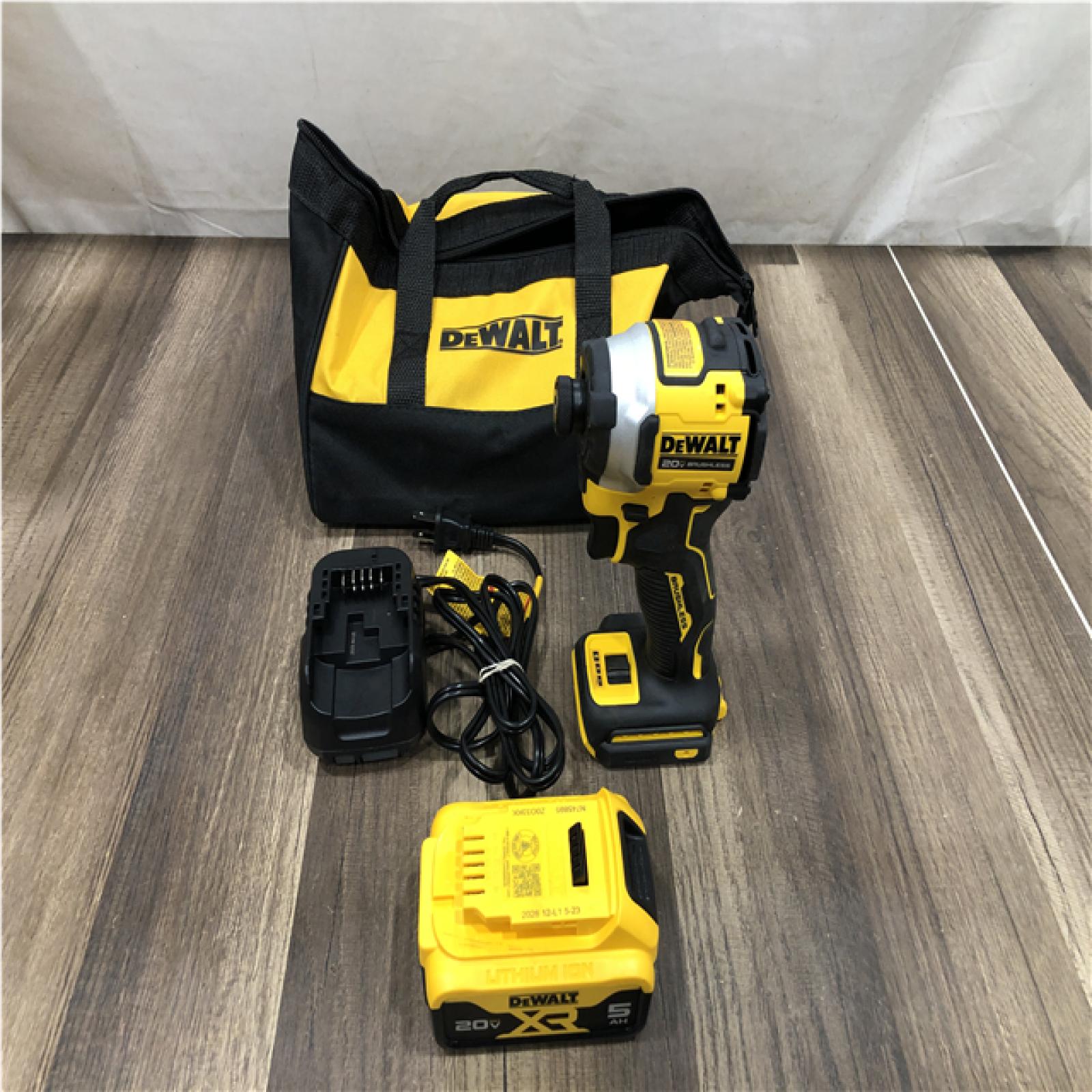 AS-IS DEWALT ATOMIC 20V MAX Lithium-Ion Cordless 1/4 in. Brushless Impact Driver Kit