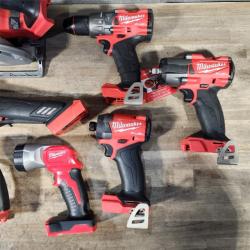 HOUSTON LOCATION - AS-IS Milwaukee M18 FUEL 18V Lithium-Ion Brushless Cordless Combo Kit with Two 5.0 Ah Batteries  1 Charger  2 Tool Bags (7-Tool)