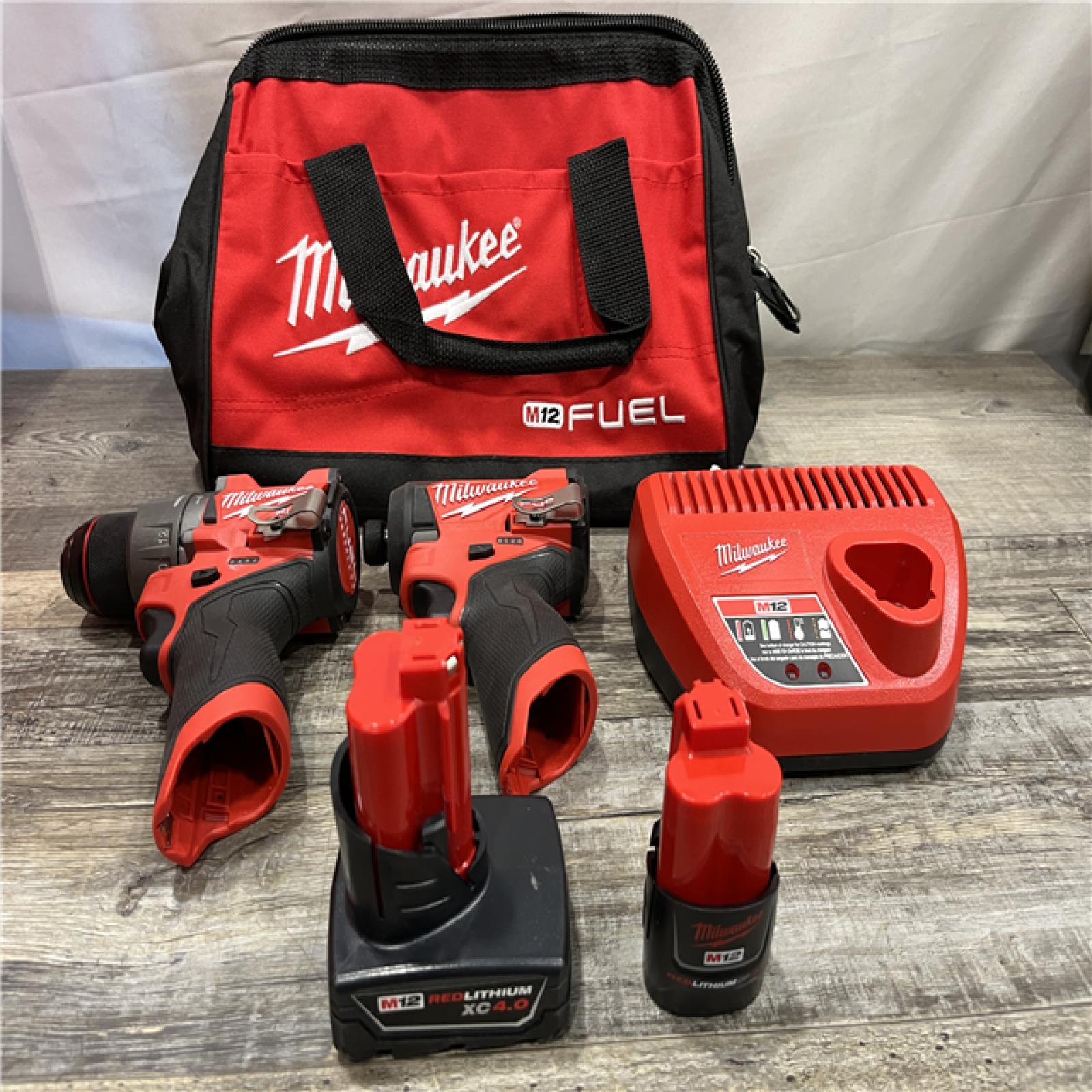 AS-IS Milwaukee FUEL 12-Volt Lithium-Ion Brushless Cordless Hammer Drill and Impact Driver Combo Kit